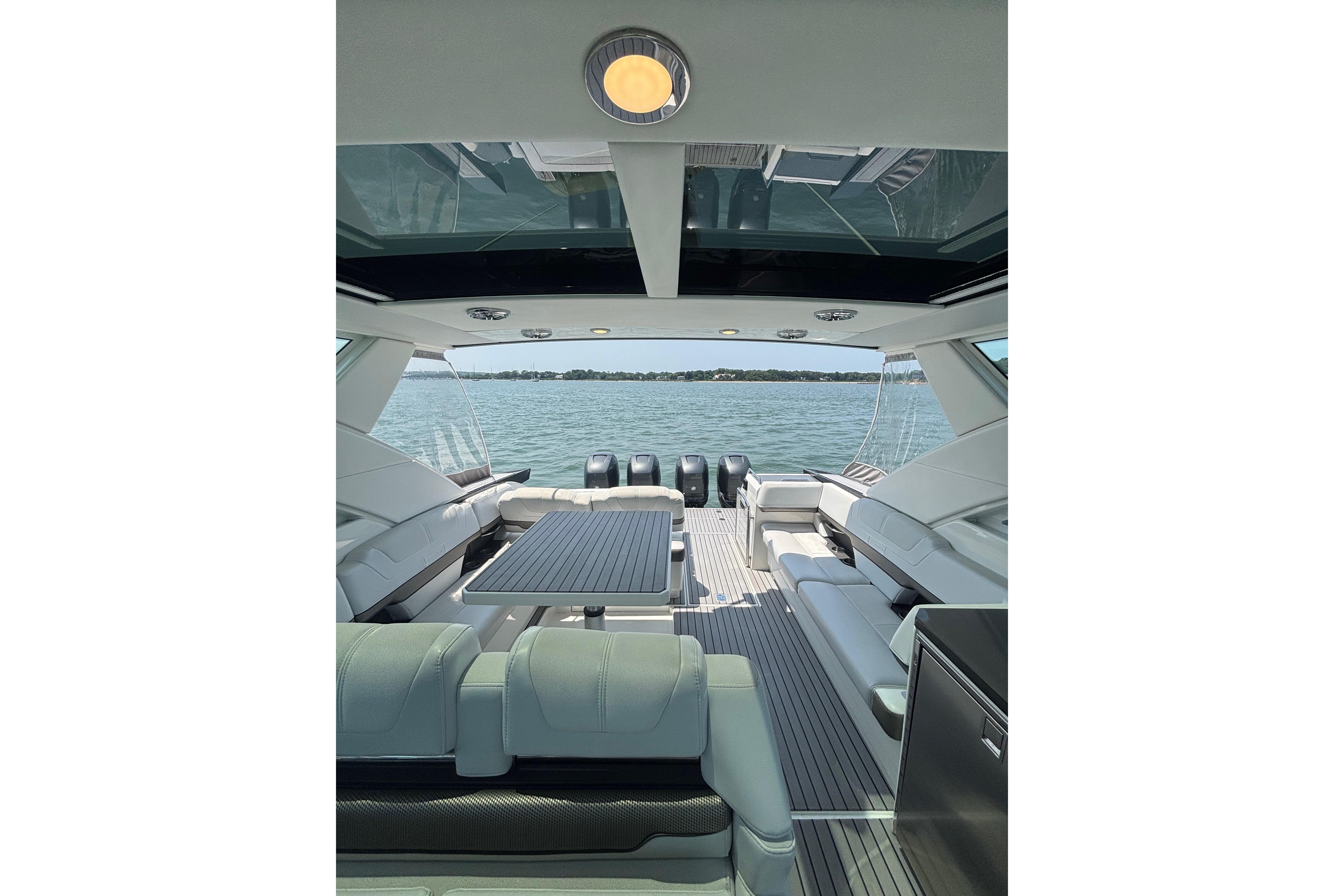 2019 Formula 430 Super Sport Crossover interior with luxurious seating and scenic water view.