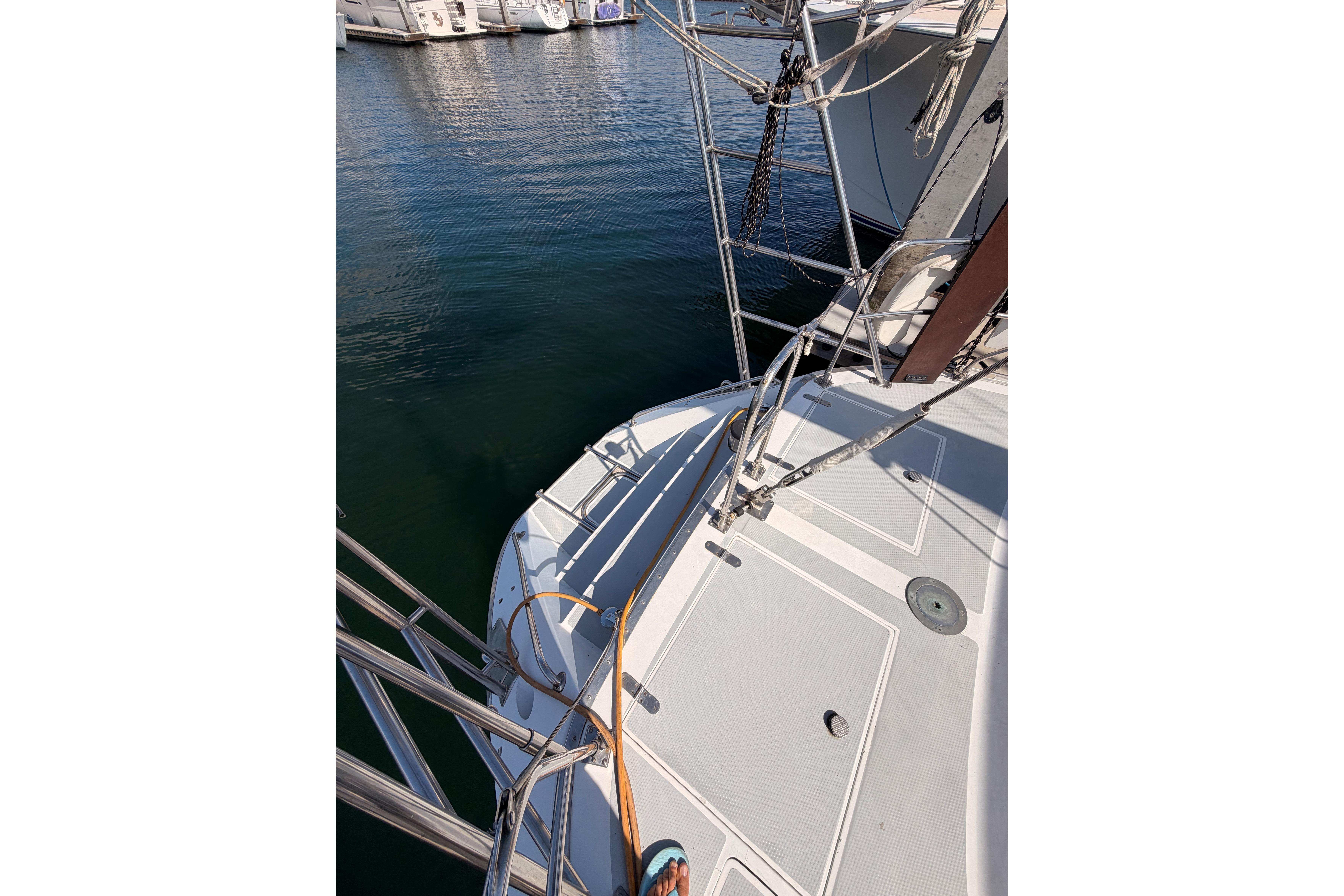 Sailboat deck of a 1991 Hylas 51, docked at a marina.