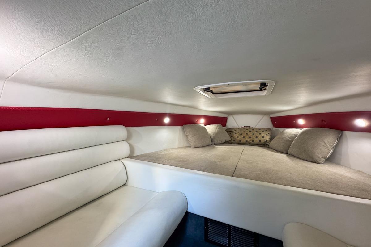 2022 Velocity 290sc cabin interior with cozy seating and ambient lighting.