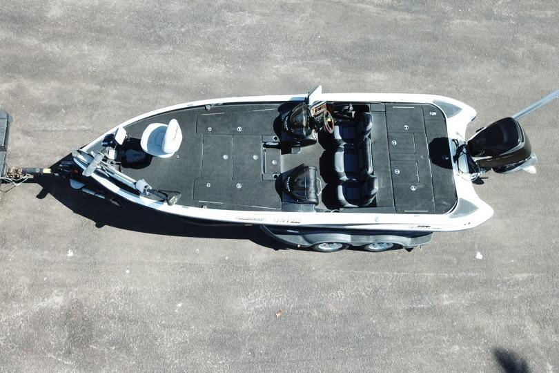 Aerial view of 2005 Triton Tr-21X PD fishing boat on trailer.