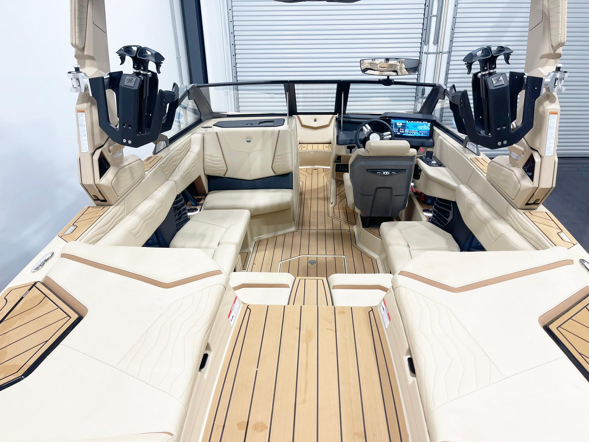 2025 Nautique Super Air Nautique G25 interior with luxurious seating and advanced dashboard.