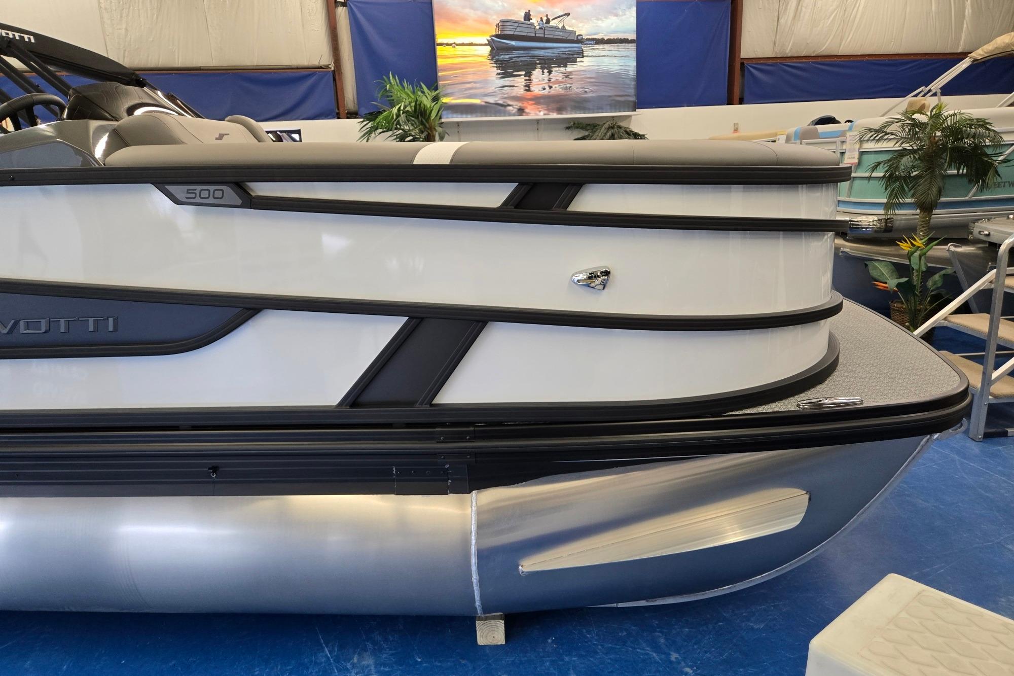 2026 Evotti 521CS pontoon boat displayed indoors with sleek design and modern features.