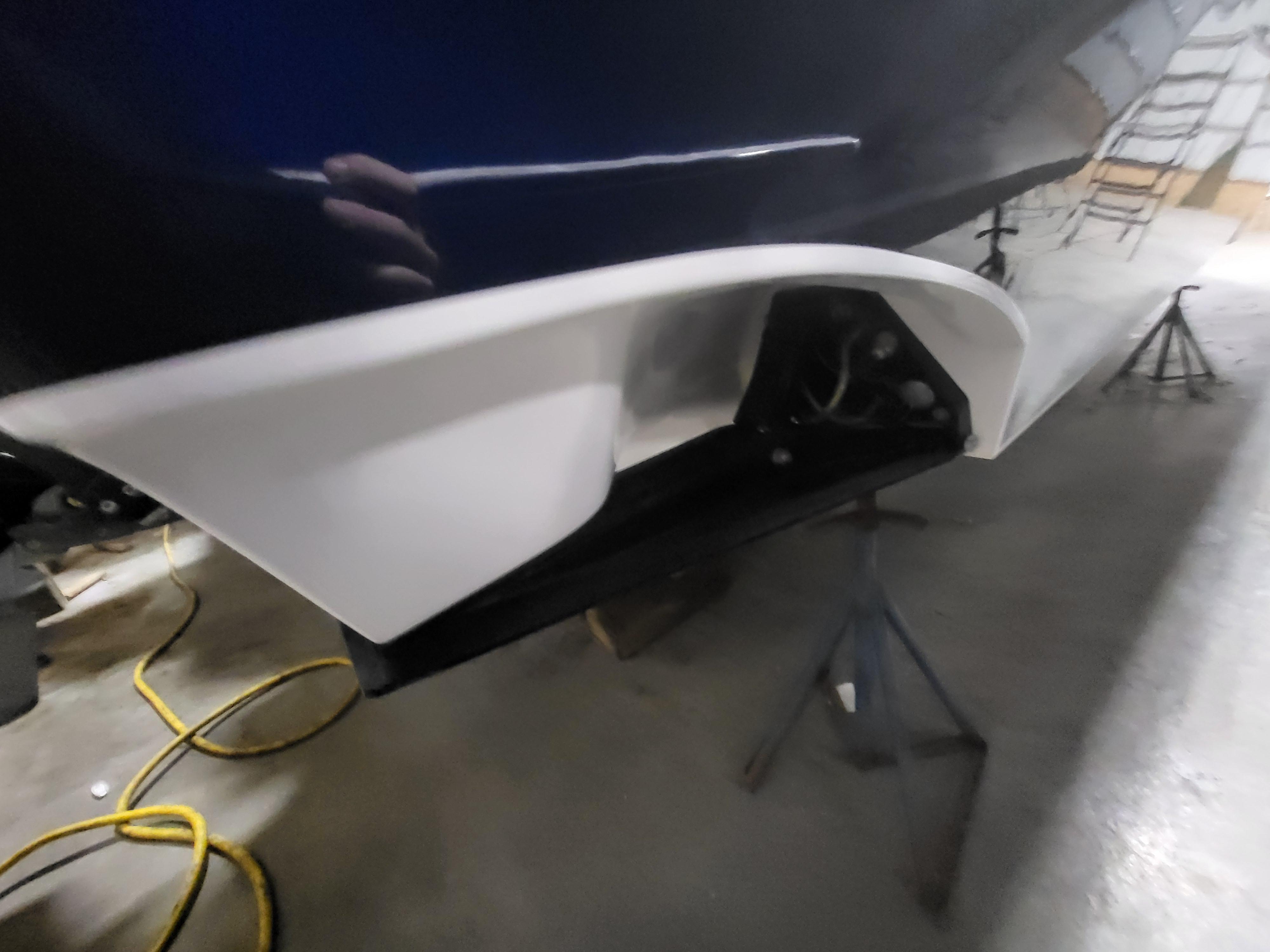 2022 Fountain 38 SC boat detail in a workshop setting.
