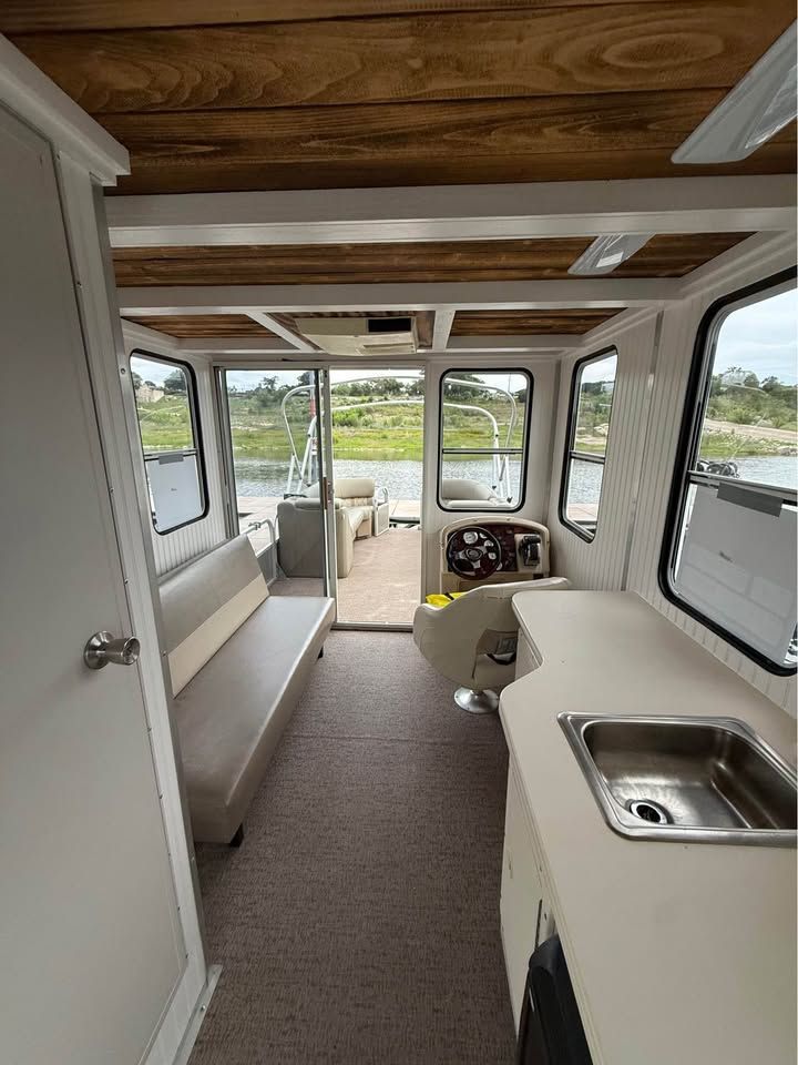 Interior of a 2008 Sun Tracker Party Cruiser boat.