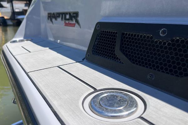 2024 Moomba Max boat with Raptor engine detail, featuring sleek design and modern finishes.