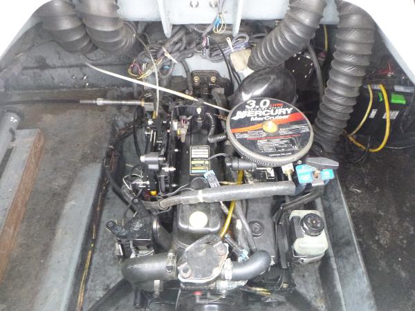 2007 Bayliner 197 Deck Boat engine compartment with 3.0L MerCruiser motor.