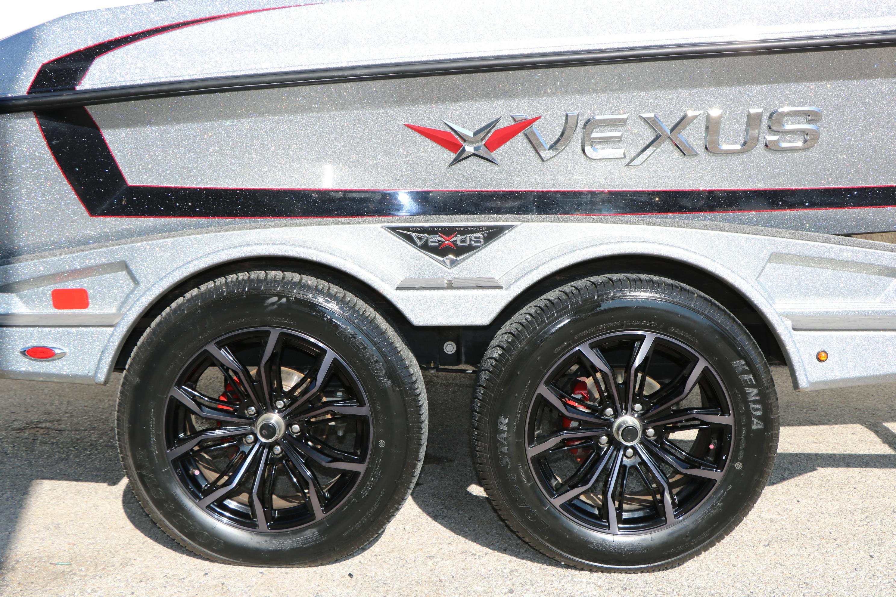 2022 Vexus VX21 boat trailer with sleek black wheels and metallic finish.