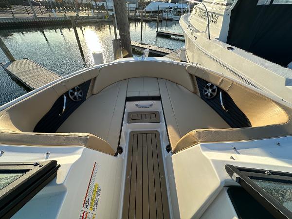 Interior view of a 2021 Sea Ray SPX 190 boat at the dock.