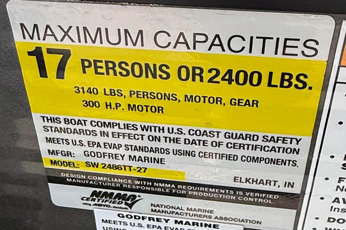 Capacity label for 2022 Godfrey SWEETWATER 2486, 17 persons or 2400 lbs, 300 HP motor.