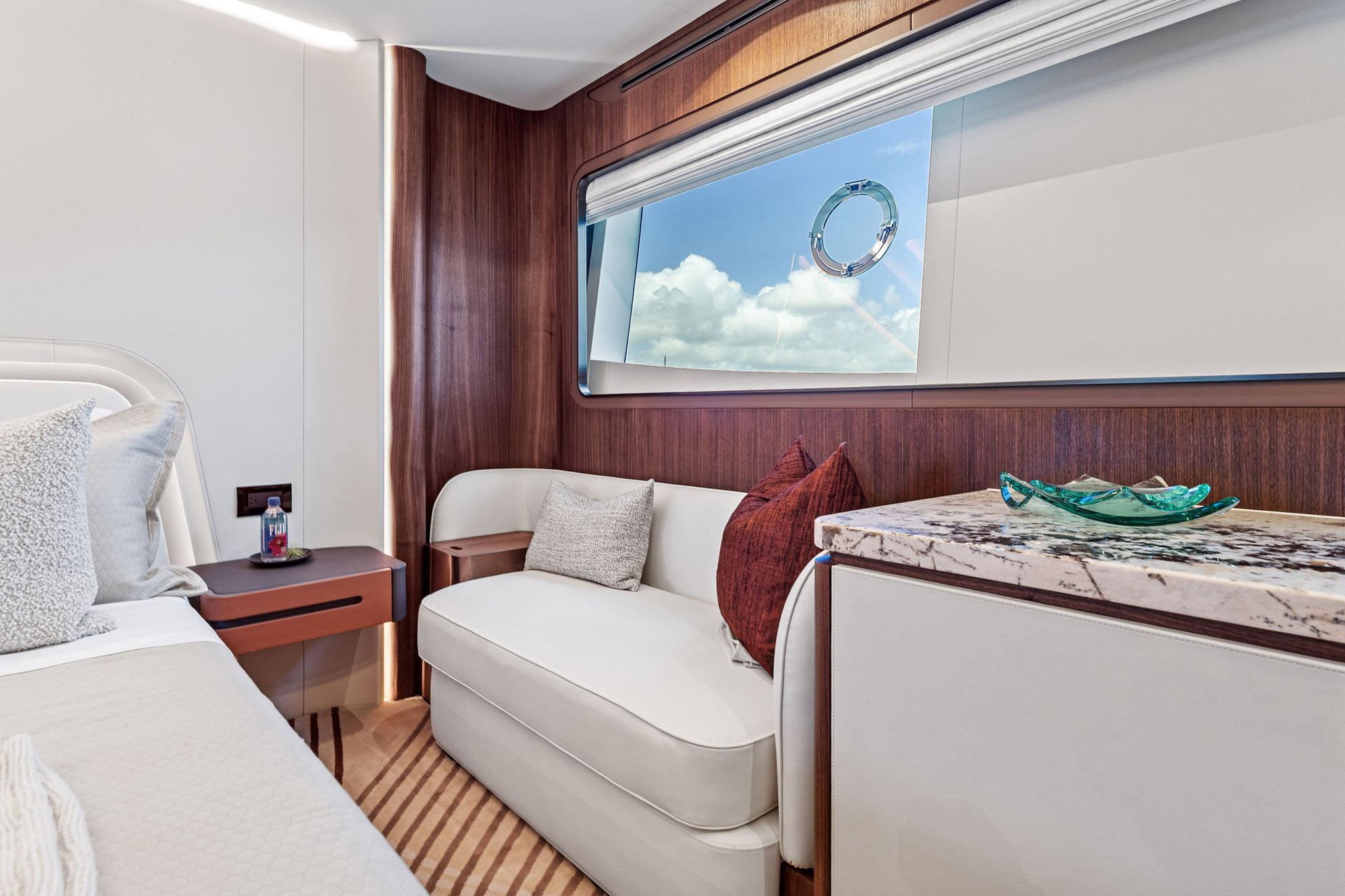 Luxurious interior of 2024 Aquitalia 78 Fly yacht with elegant seating and decor.