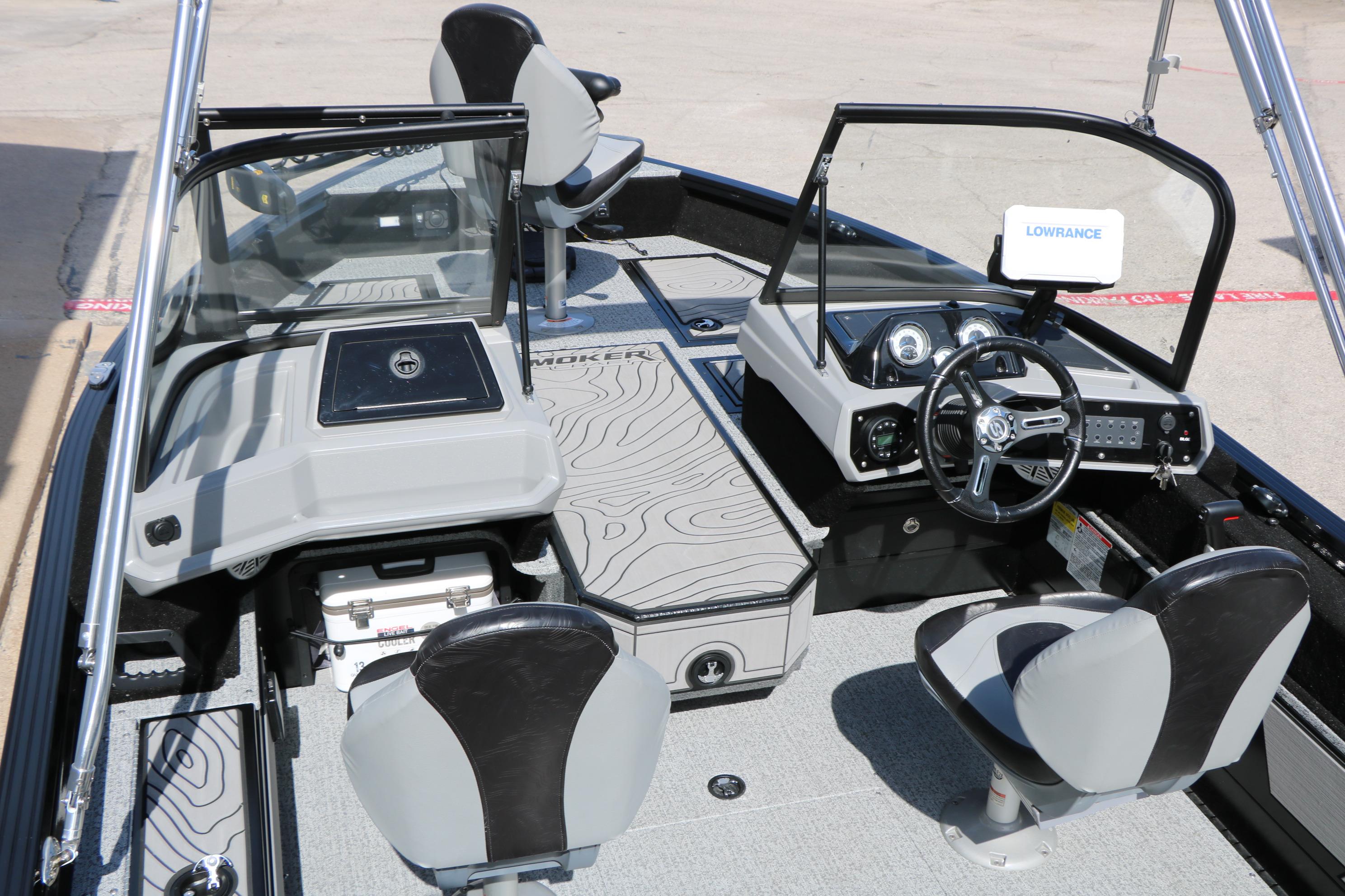 2025 Smoker Craft Adventurer 188 DC boat interior with modern dashboard and seating.