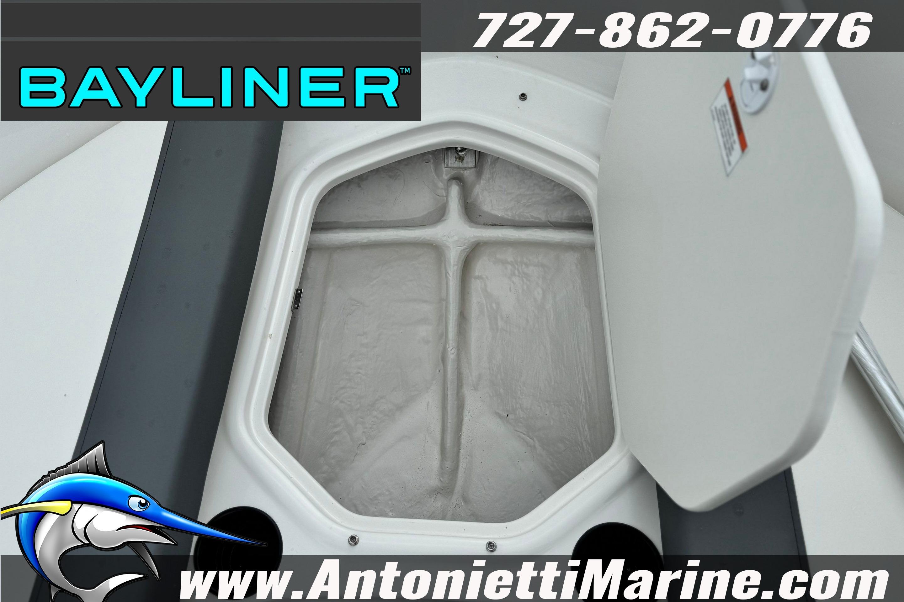 2026 Bayliner Element E16 storage compartment open, showcasing interior space.
