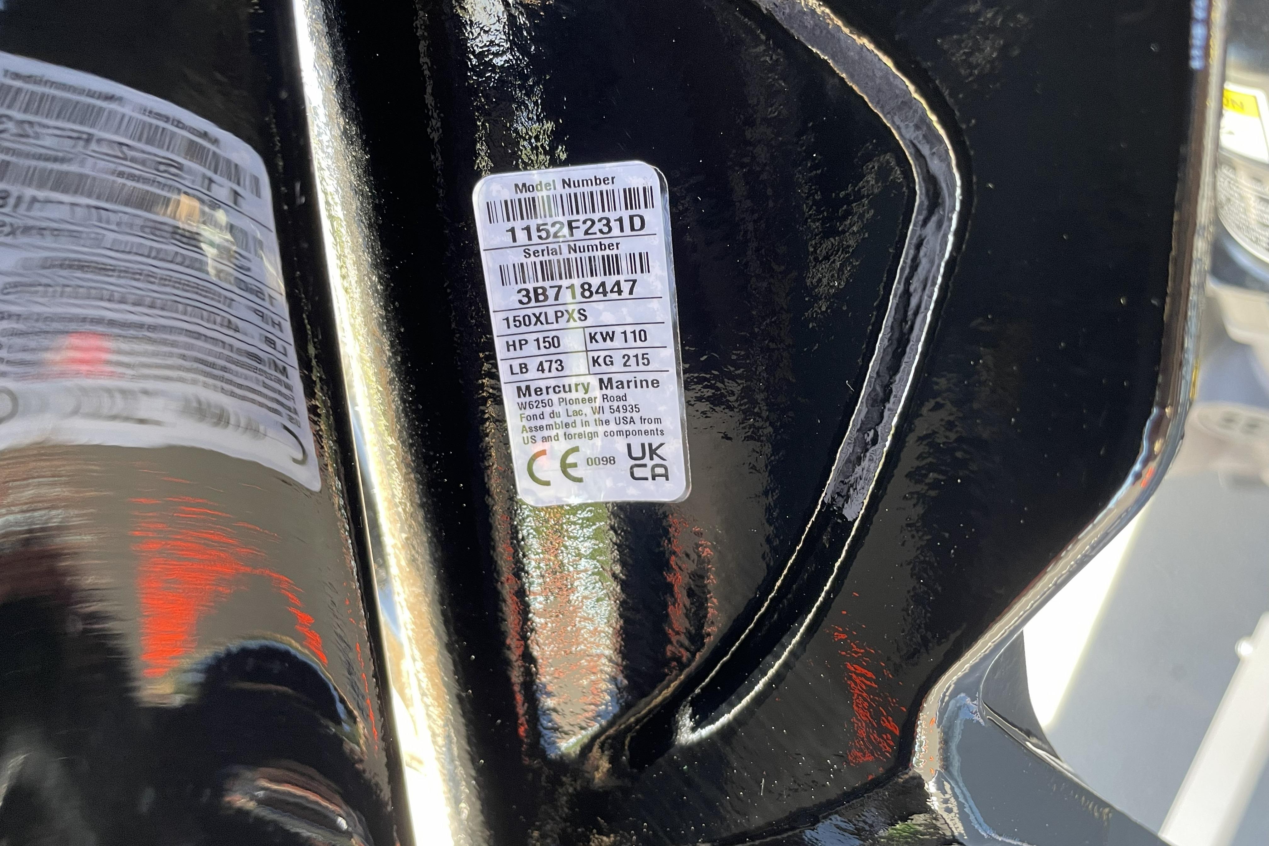 Label on a 2026 Mako Pro Skiff 19 CC boat engine, showing model and serial numbers.