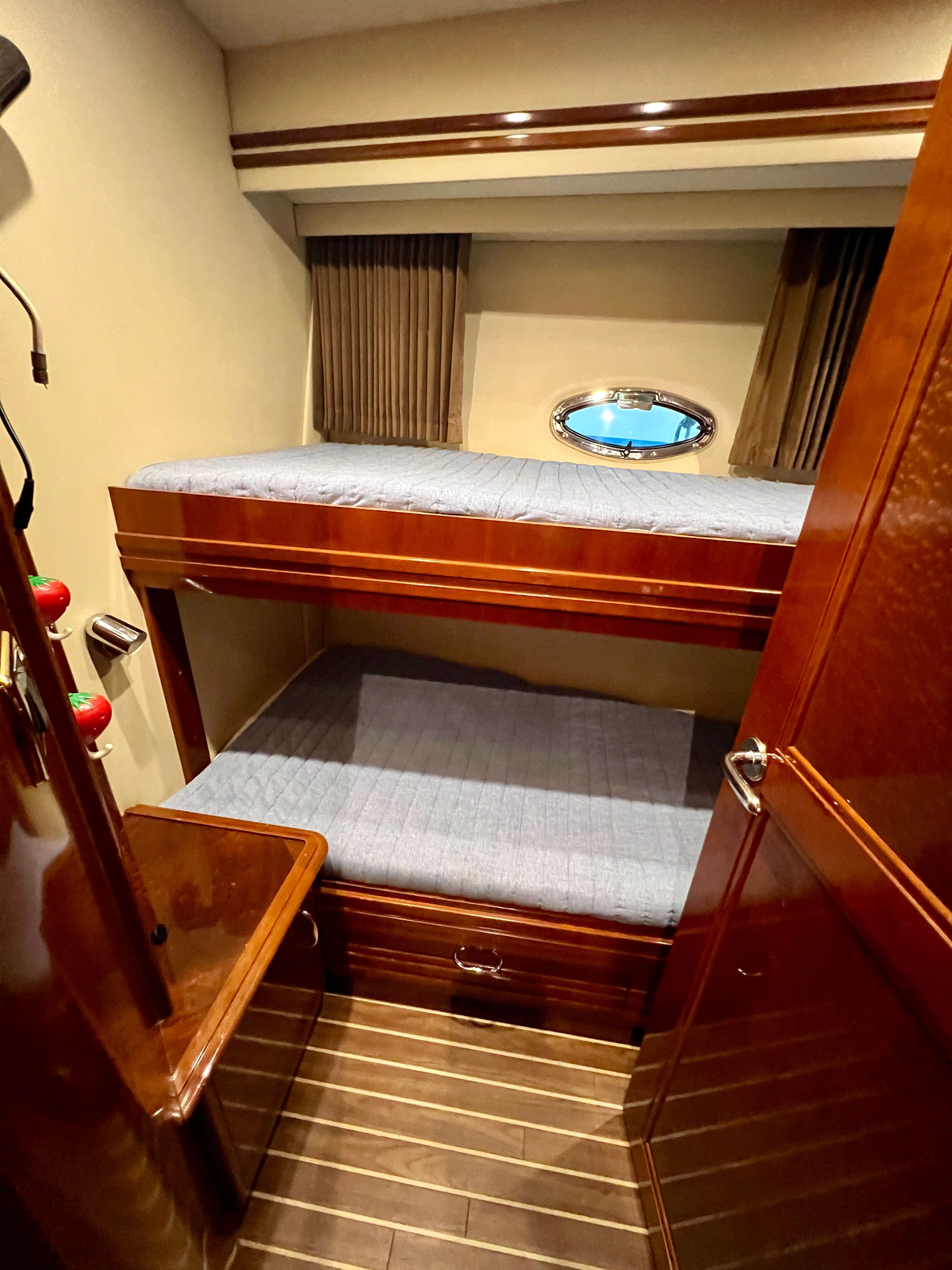 Interior of 2005 Carver 560 Voyager Sky with bunk beds.