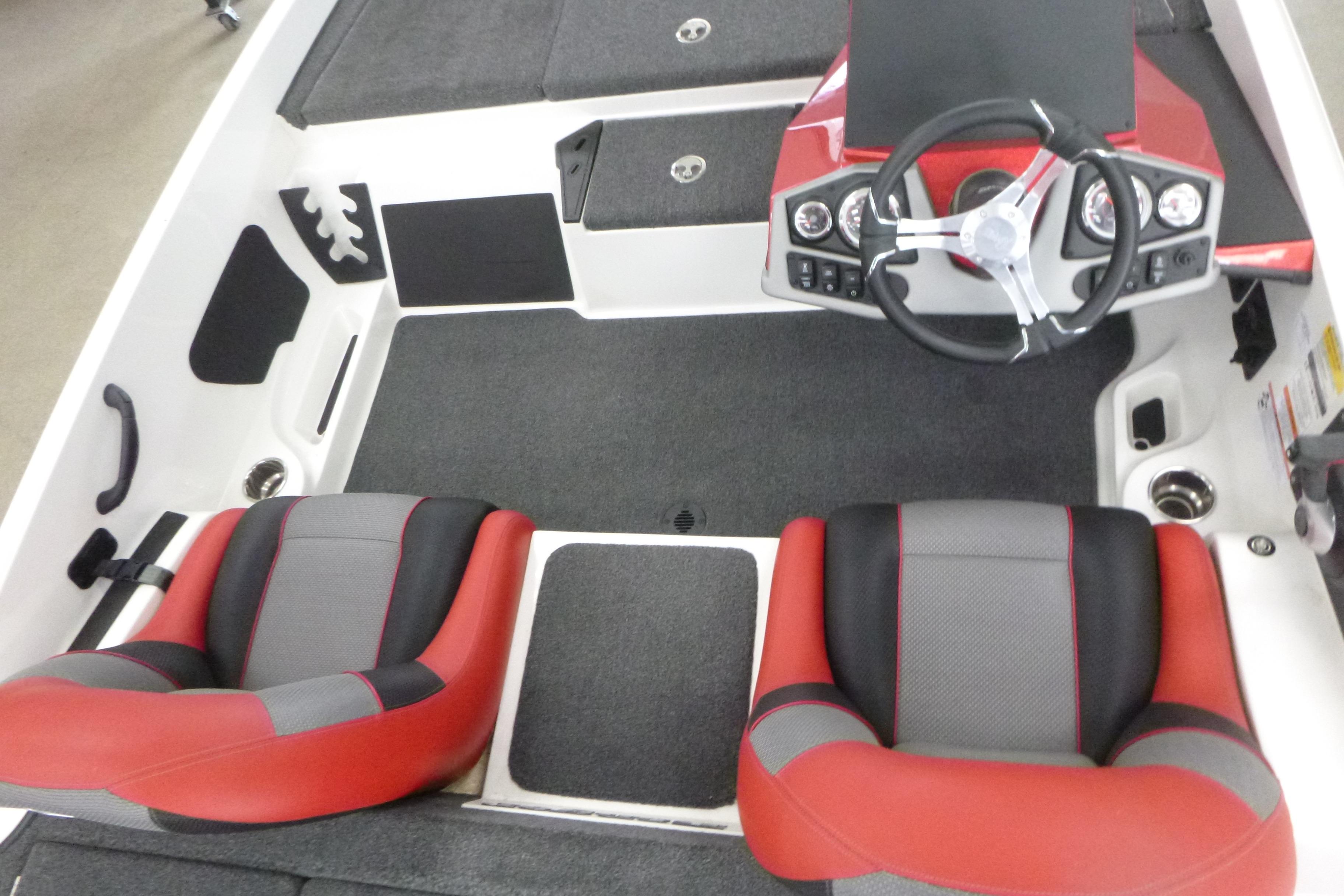 2025 Ranger Z185 boat interior with red and gray seats, steering wheel, and dashboard.