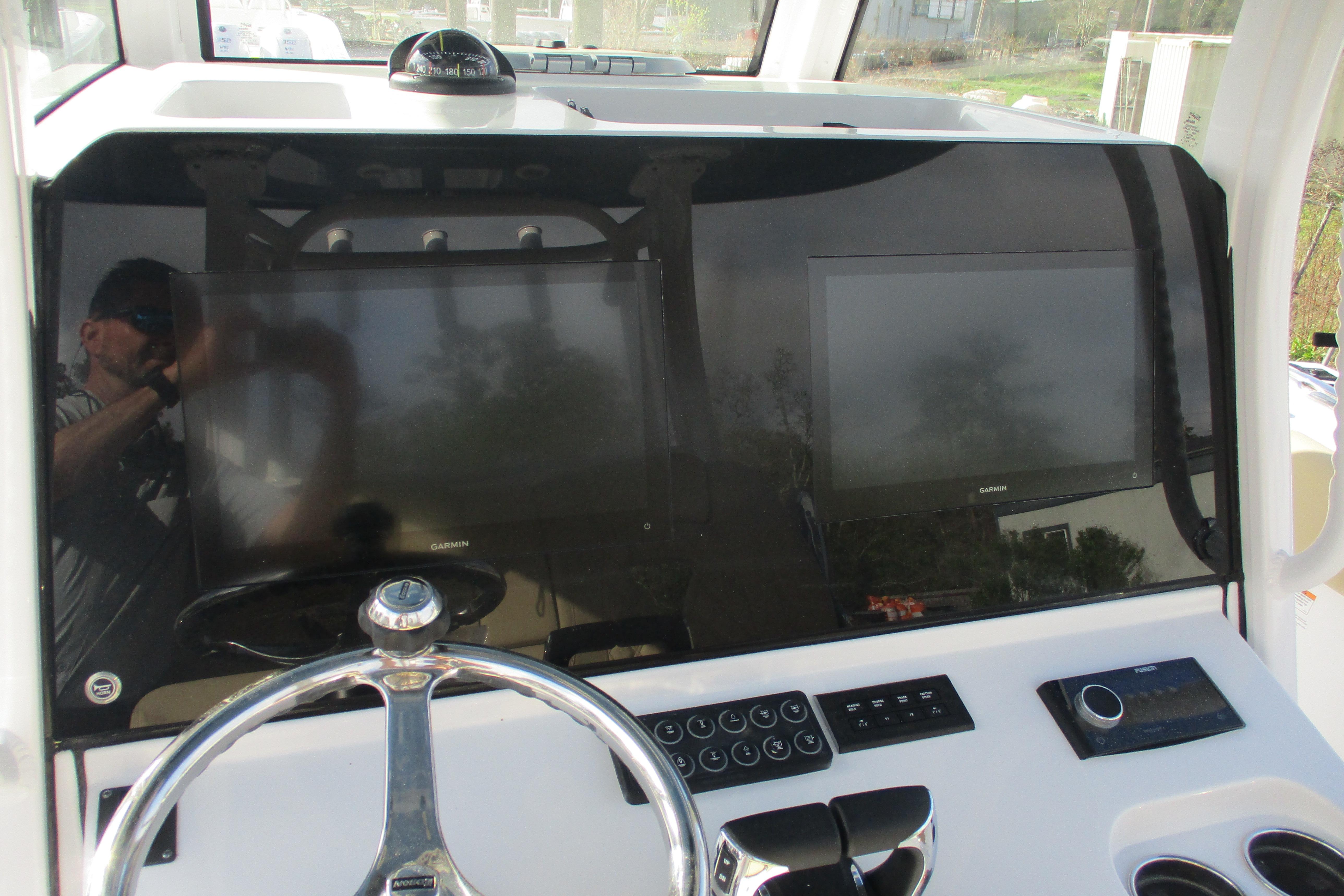 2026 Sportsman Open 302 Center Console dashboard with steering wheel and electronic displays.