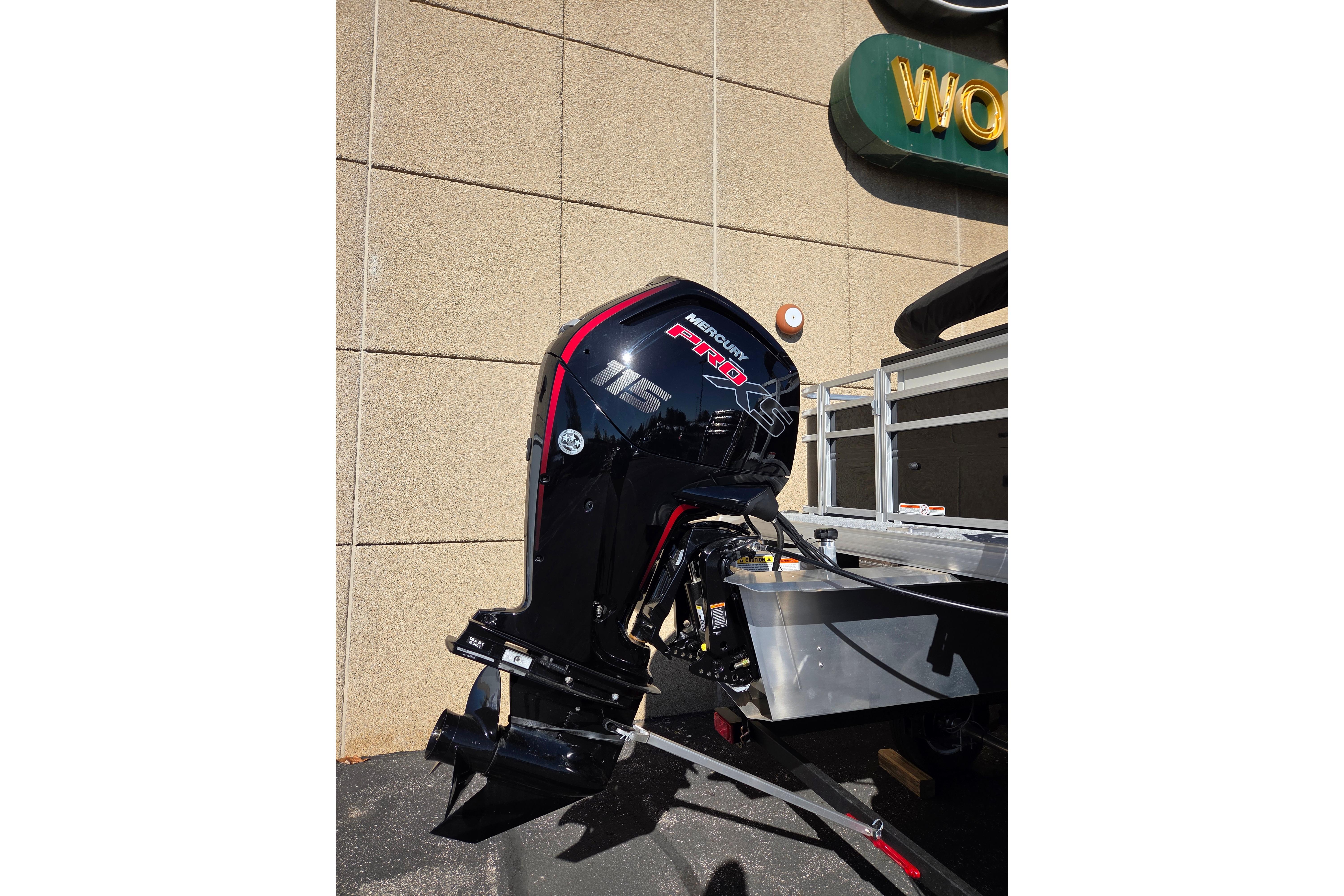 2026 Sun Tracker Fishin' Barge 20 DLX with Mercury Pro XS outboard motor.