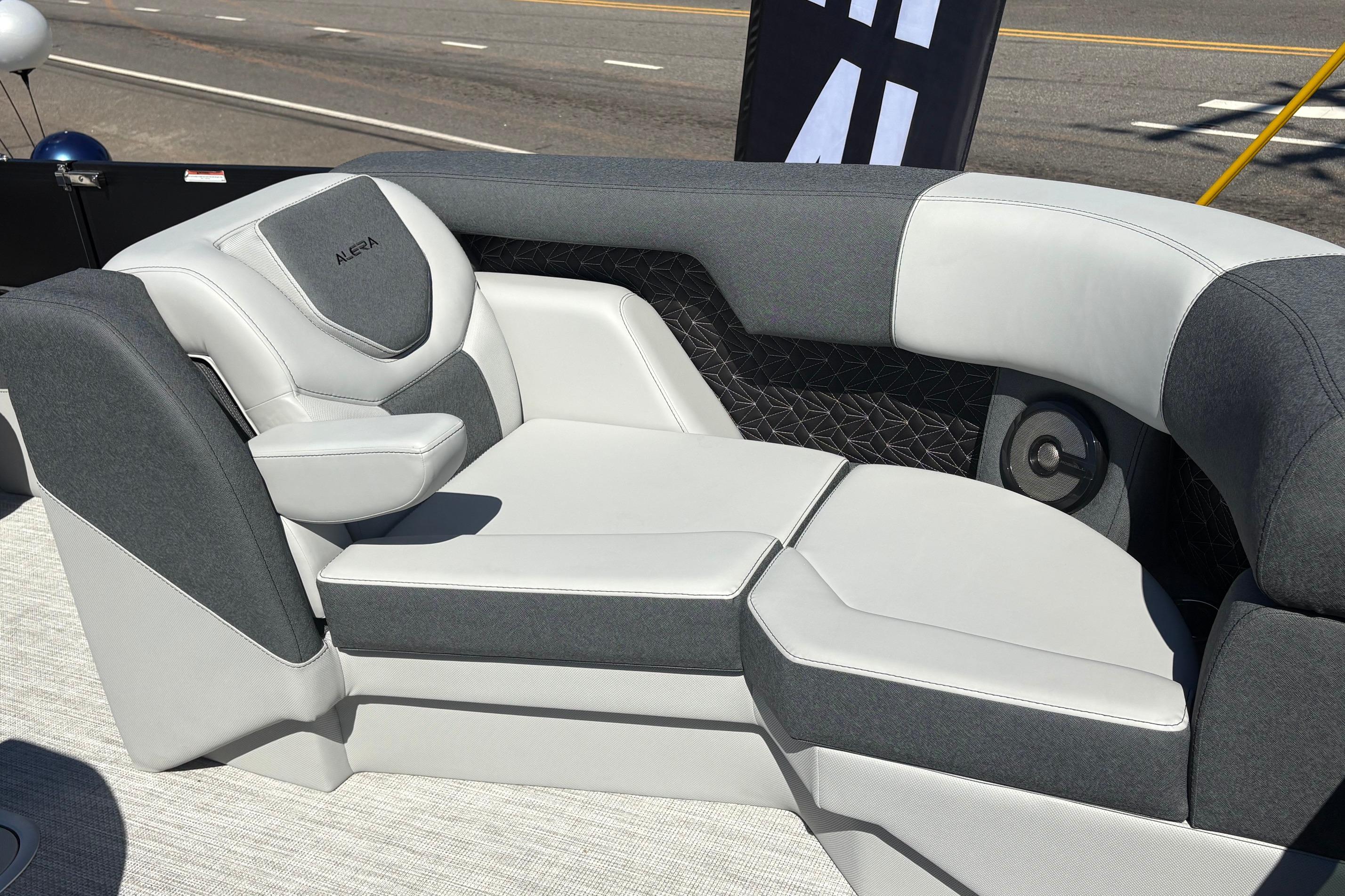 Luxurious seating in the 2026 Alera 23Q boat, featuring modern design and comfort.