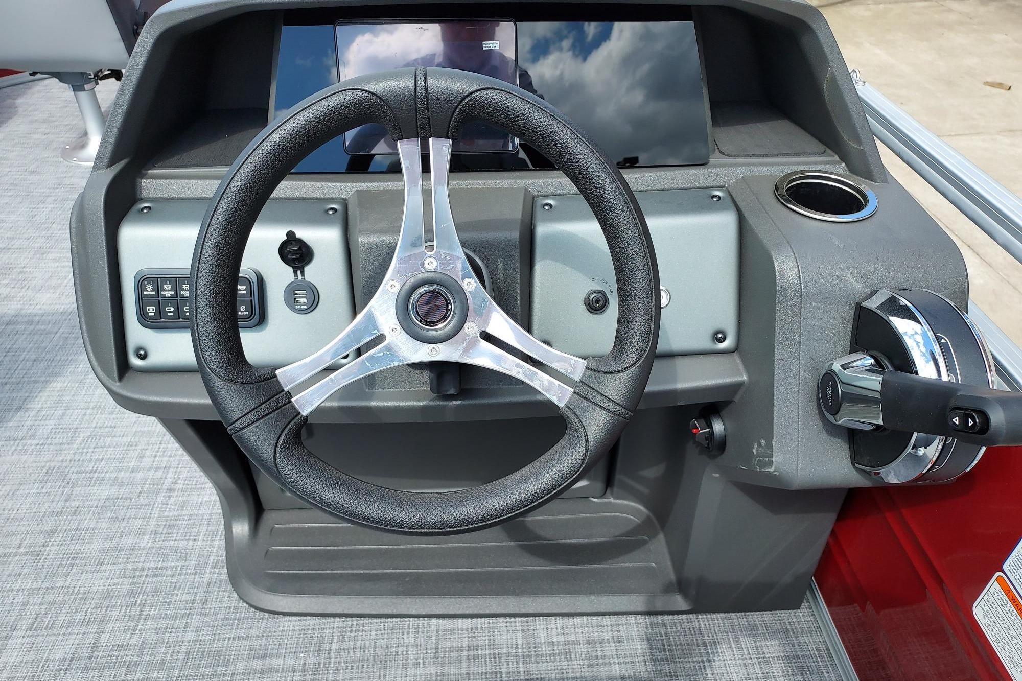 Steering console of 2026 Sun Tracker SportFish 20 DLX pontoon boat.