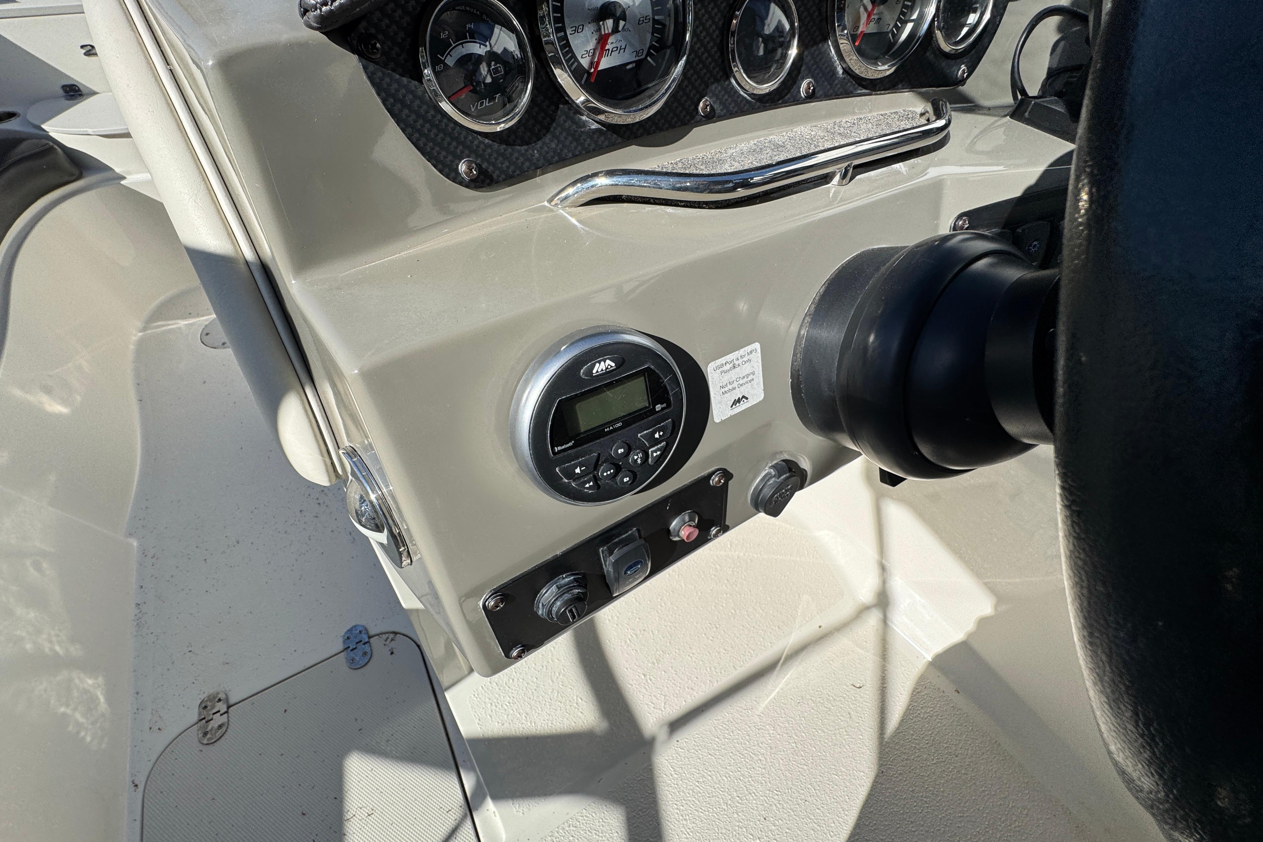 Dashboard of a 2018 Stingray 204 LR boat with gauges and controls.