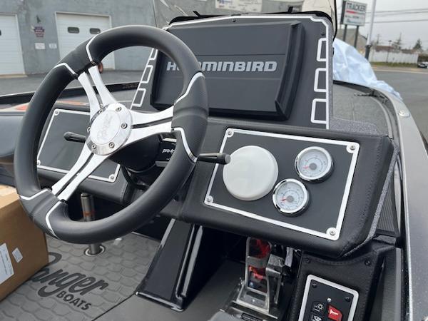 Steering console of 2025 Ranger Z520 boat with Humminbird electronics and gauges.