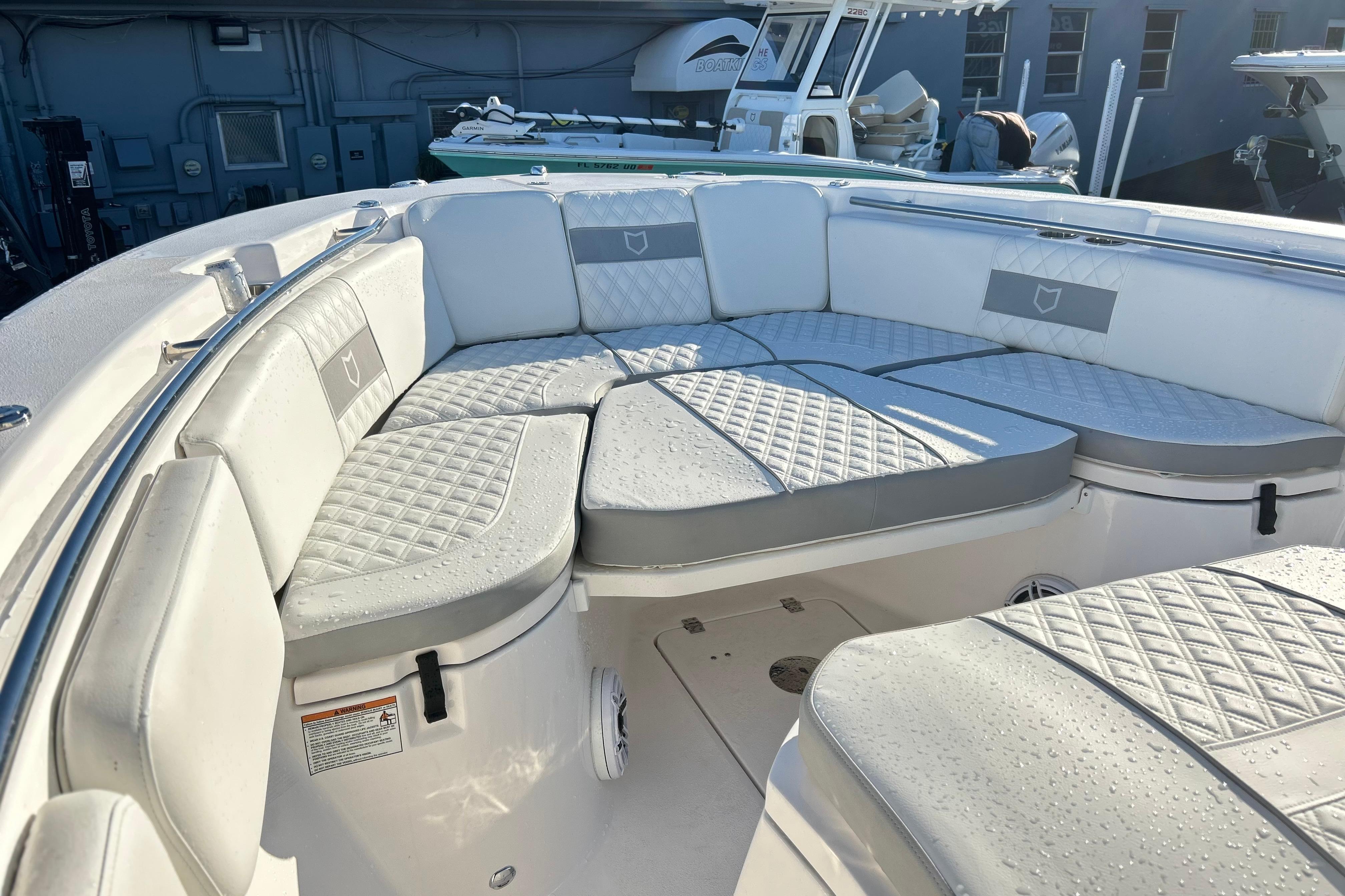 2026 Sea Fox 288 Commander boat with cushioned seating and sleek design.