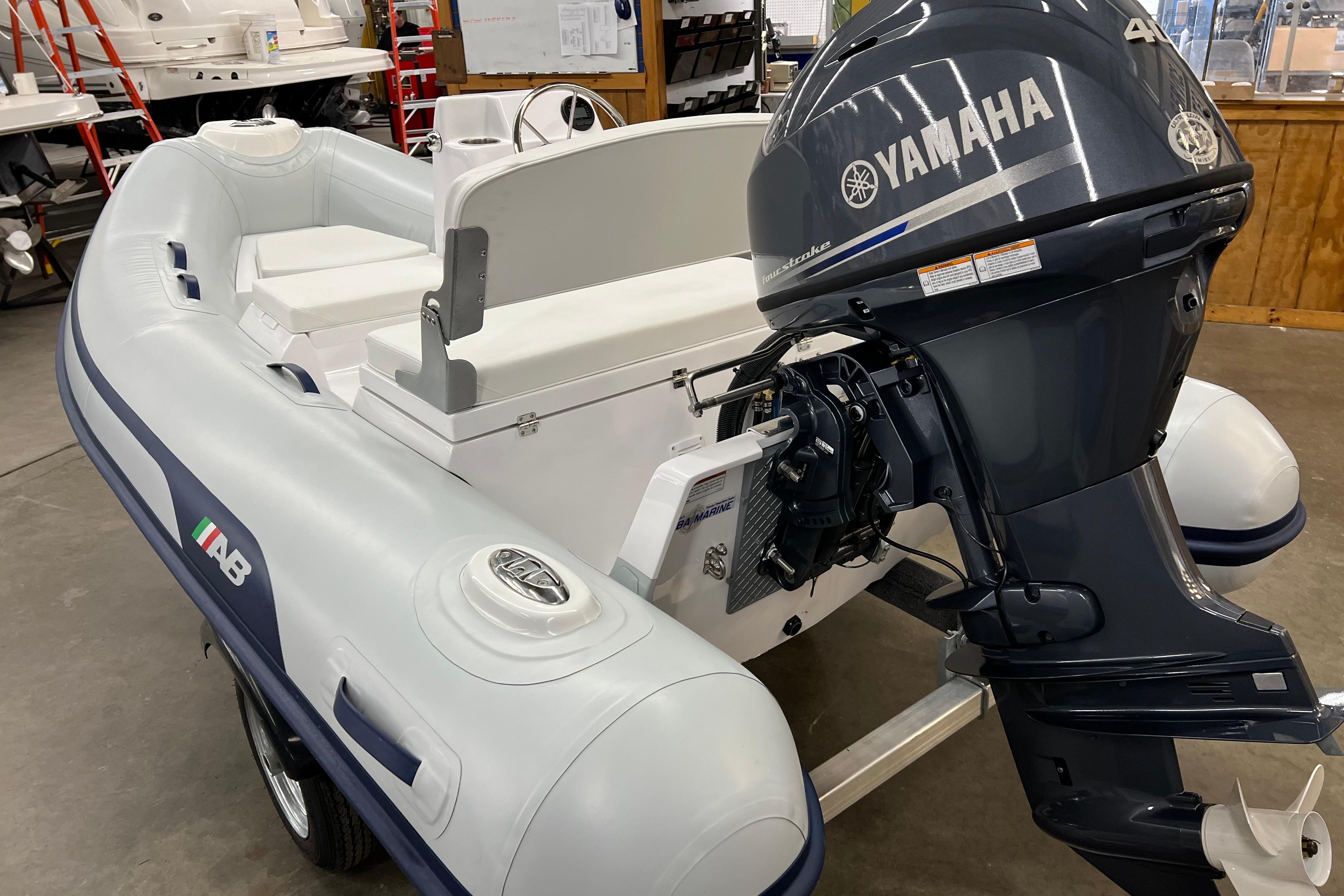 2023 AB Inflatables Mares 11 VSX with Yamaha outboard motor in showroom.