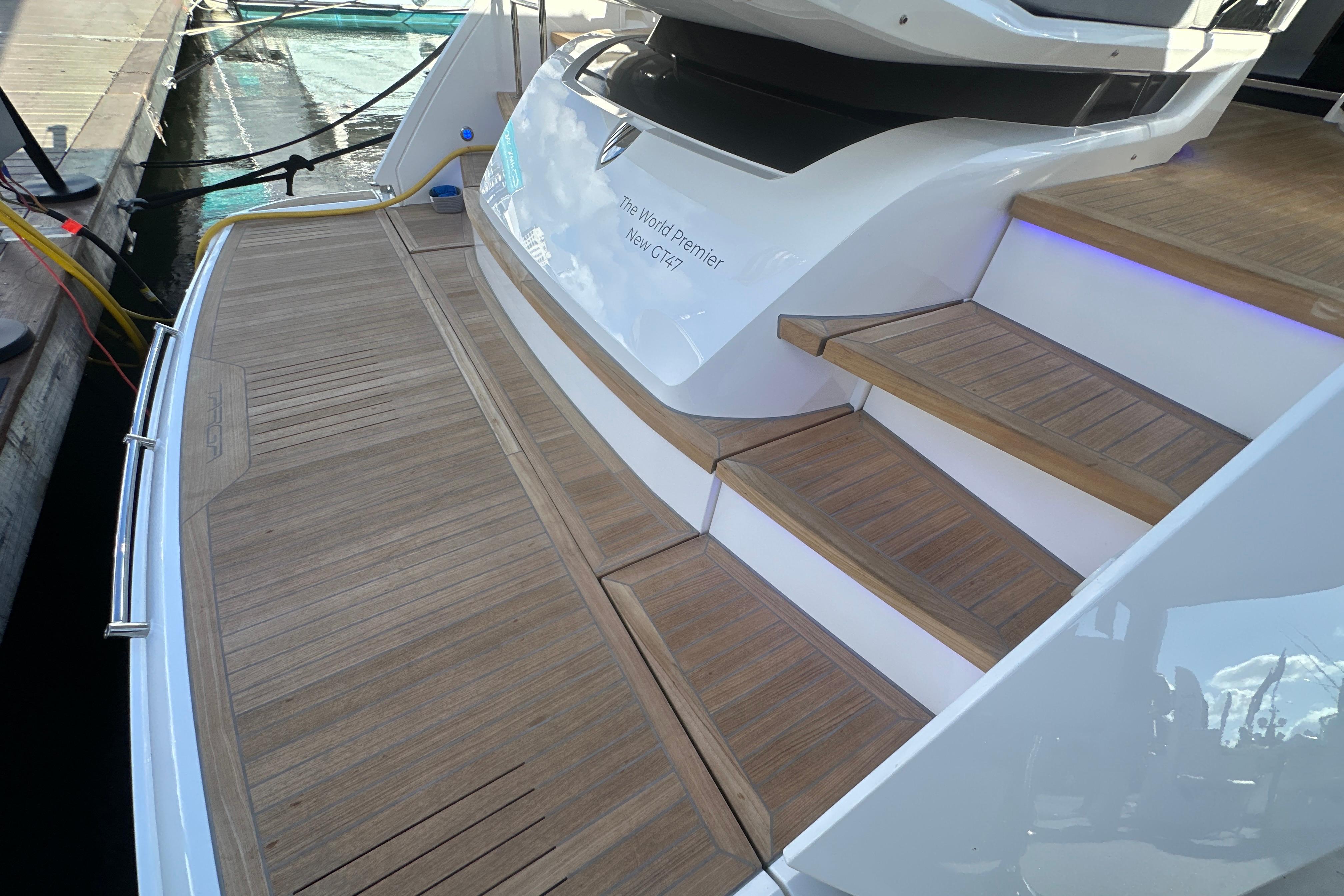 Luxury yacht Fairline Targa 47 GT 2026, featuring elegant teak decking and modern design.