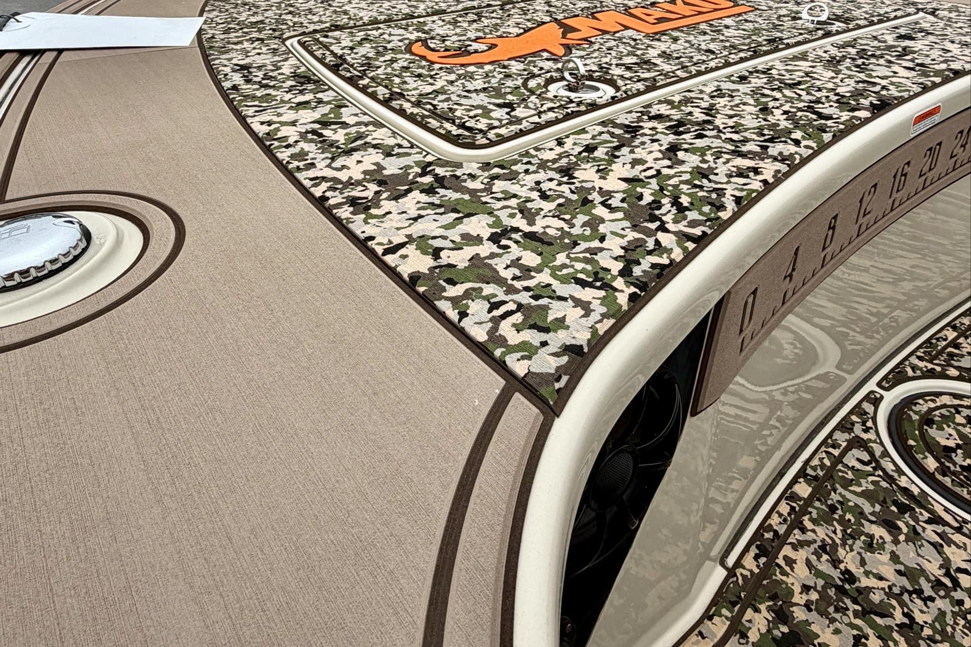 2025 Mako 18 Pro Skiff Backwater Edition with camouflage deck design and measurement markings.