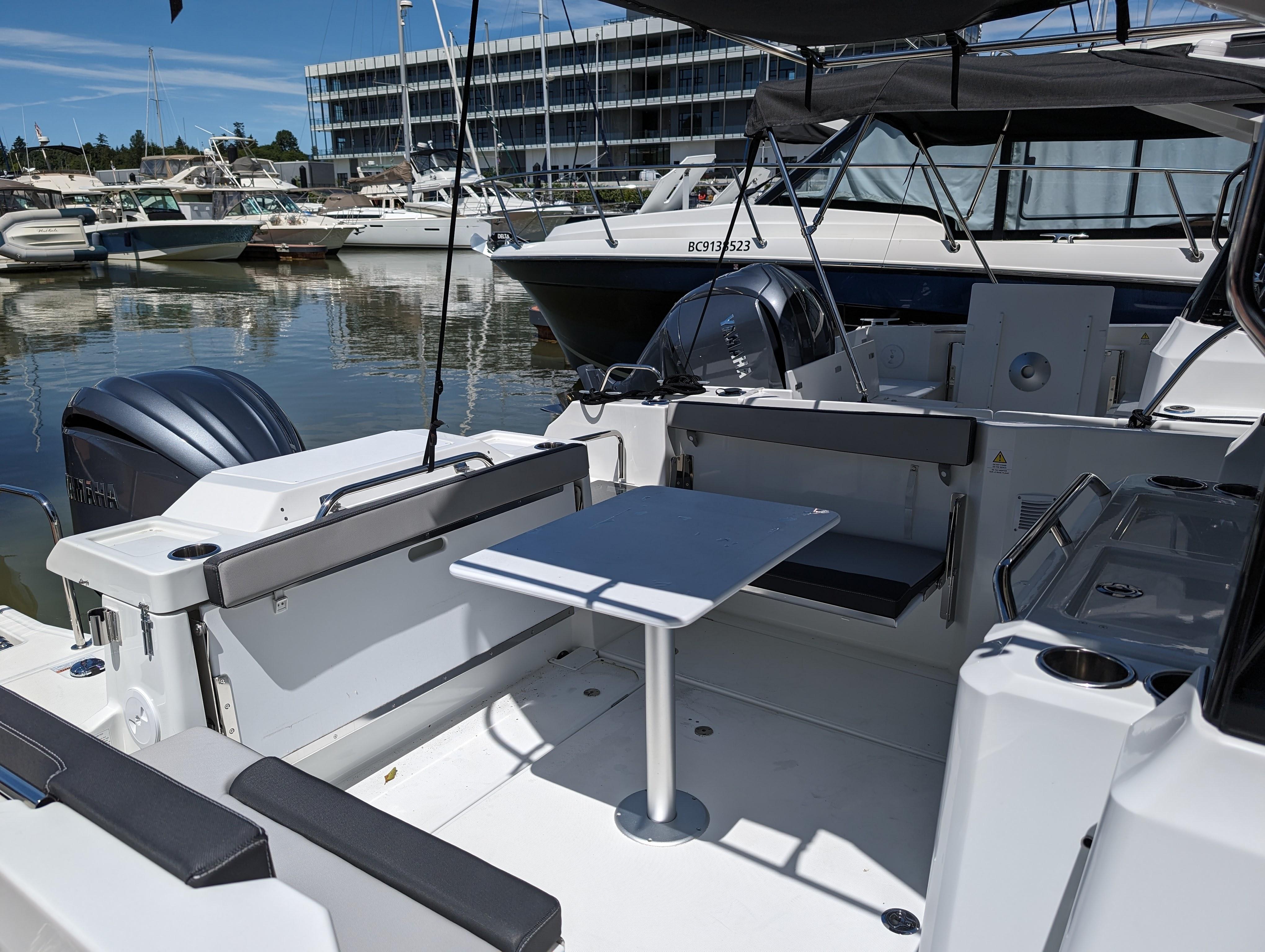 2024 Jeanneau NC Sport 795 Series 2 boat, featuring spacious deck and seating area.