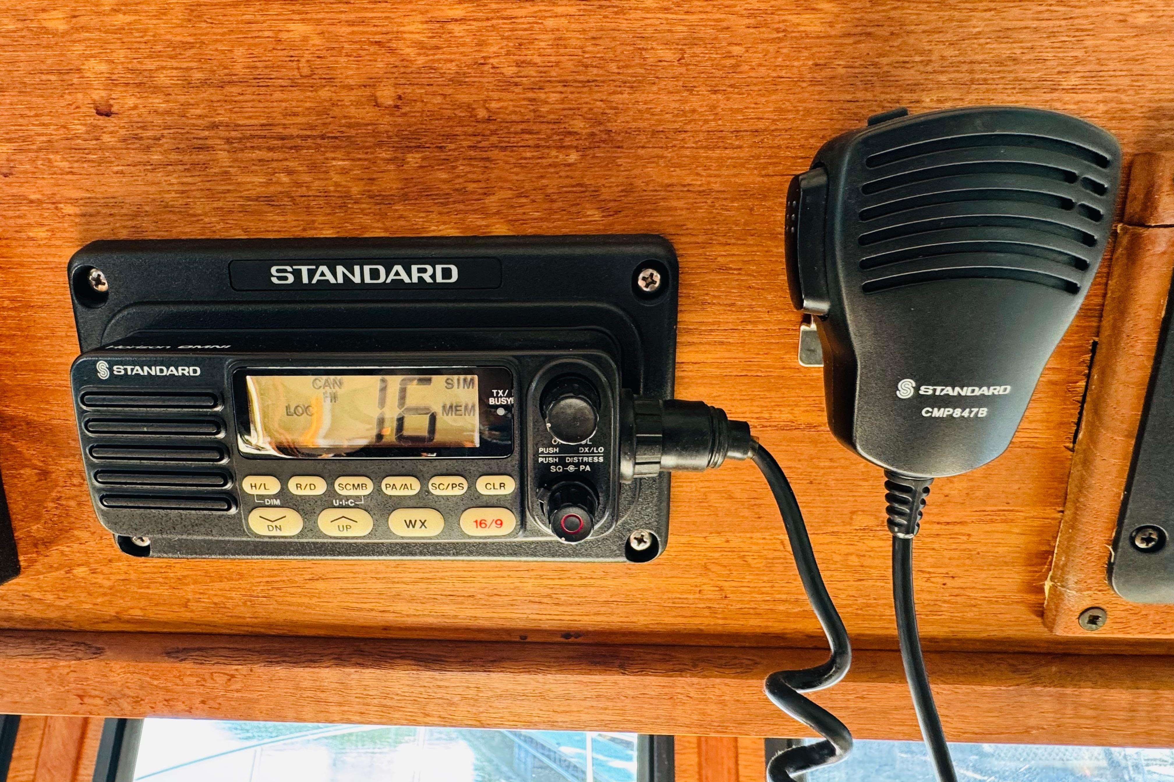 Standard marine radio and microphone on a 1996 Nordic Tug 32 boat.