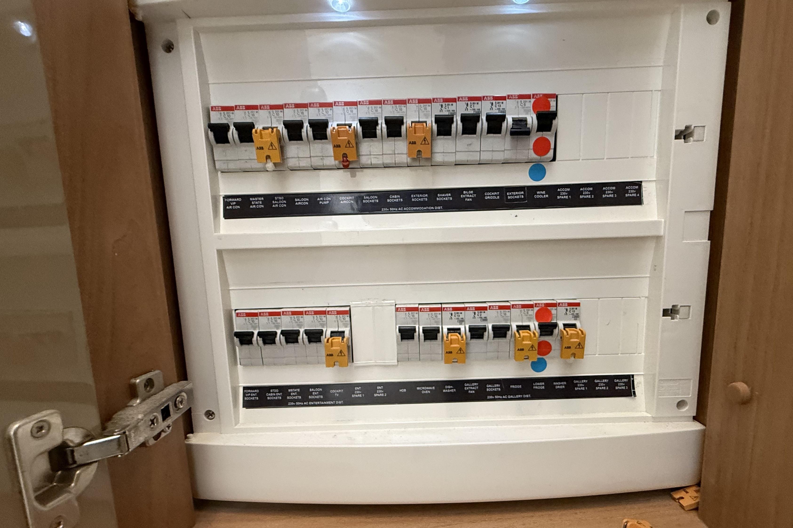 Electrical panel inside a 2012 Sunseeker Predator 60 yacht, showing circuit breakers.