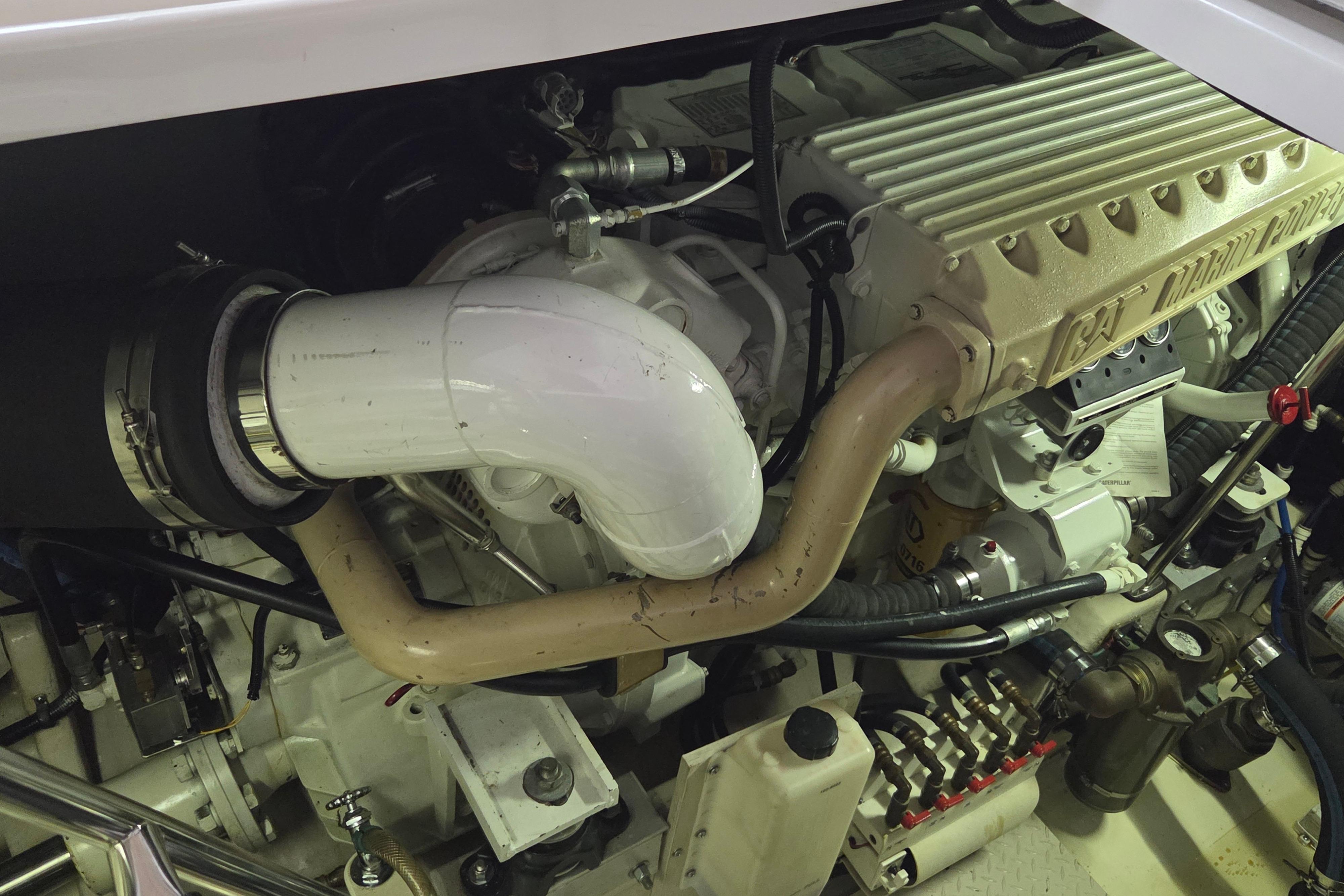 Engine compartment of a 2000 Sea Ray Sundancer 540 yacht, featuring CAT Marine Power components.