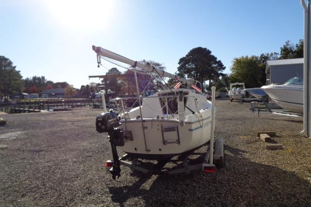 2007 Sanibel by International Marine 18 Pocket Cruiser on trailer in boatyard.