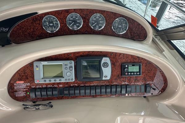 Dashboard of 2004 Sea Ray 380 Sundancer with navigation instruments and gauges.