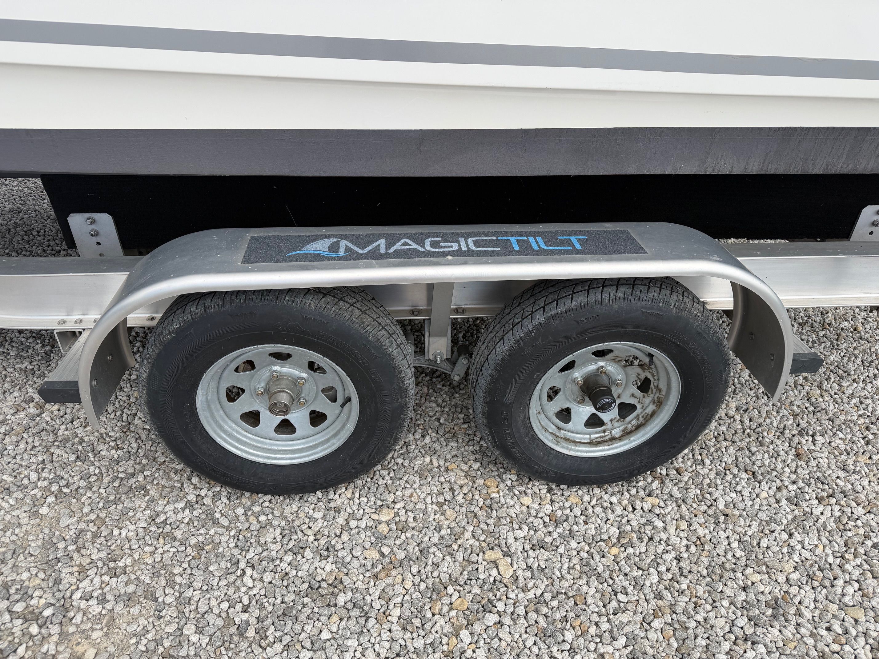 Magic Tilt trailer with Boston Whaler 230 Outrage boat, year 2020.