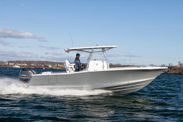 Manufacturer Provided Image: 2025 Southport 27 FE boat cruising on open water under clear blue sky.