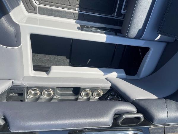 2025 Moomba Mondo interior seating with cup holders and sleek design.