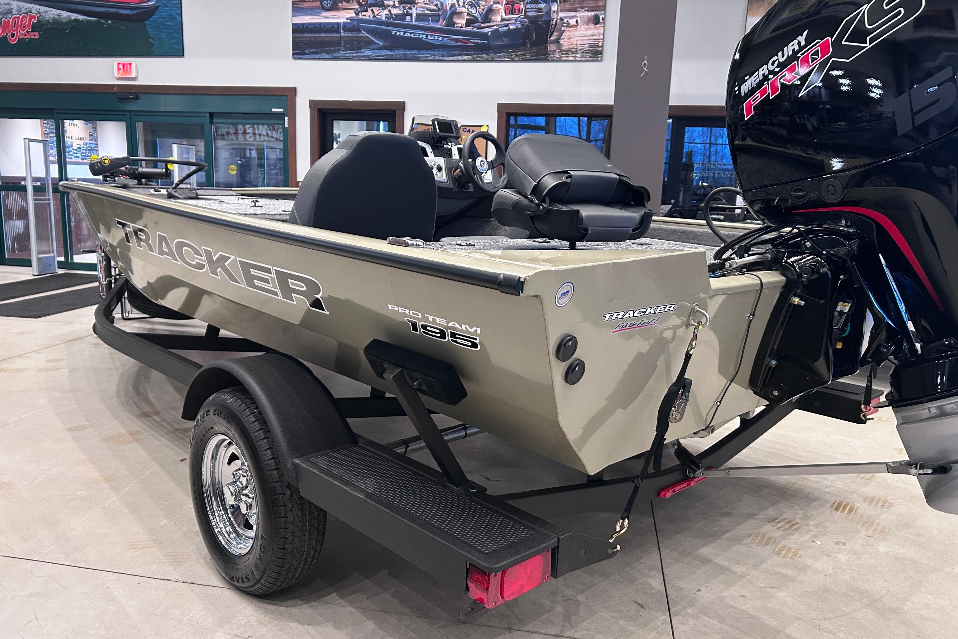 2026 Tracker Pro Team 195 boat on display with Mercury Pro XS engine.