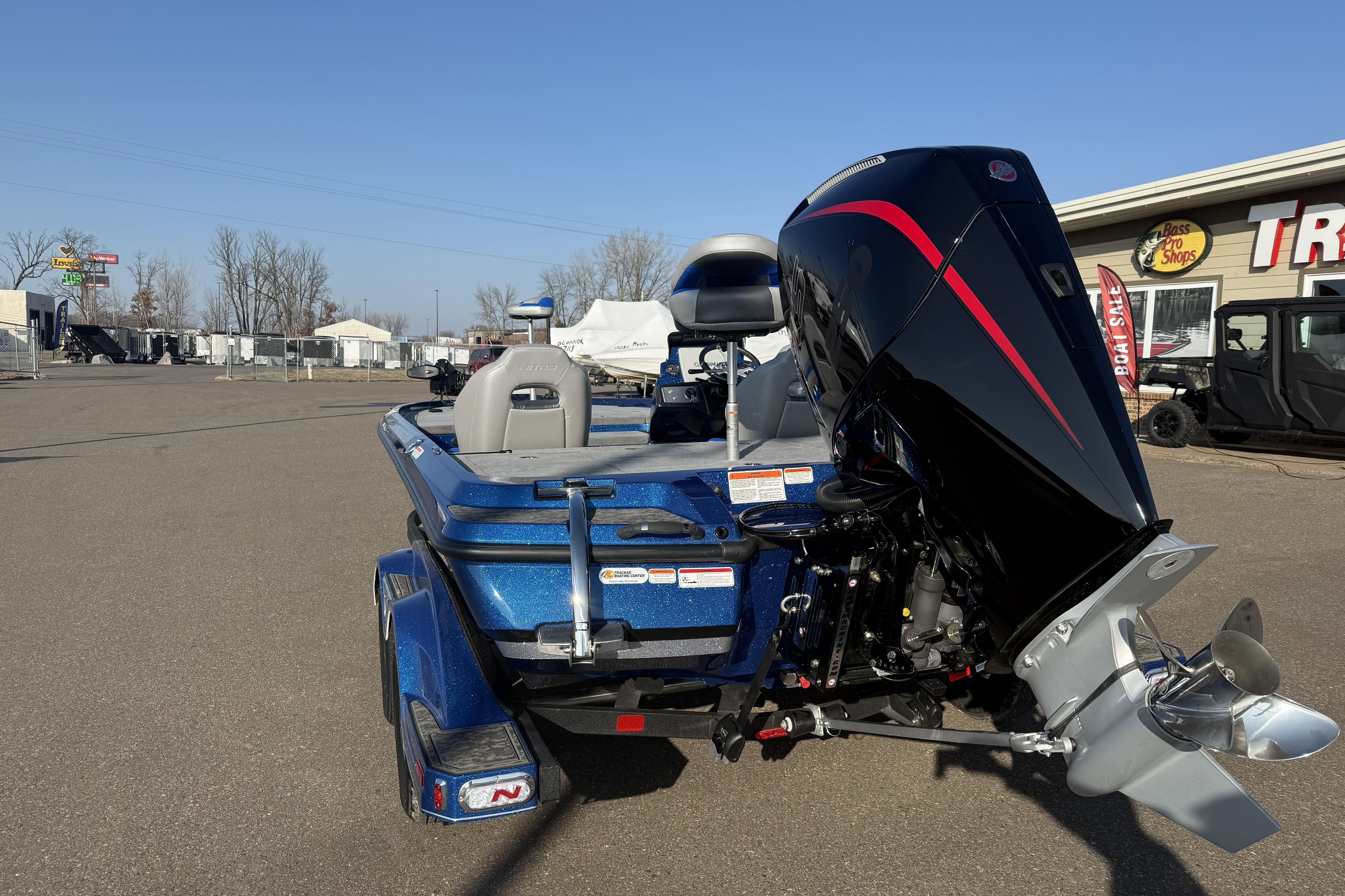 2026 Nitro Z21 XL Pro boat with powerful outboard motor in a dealership lot.