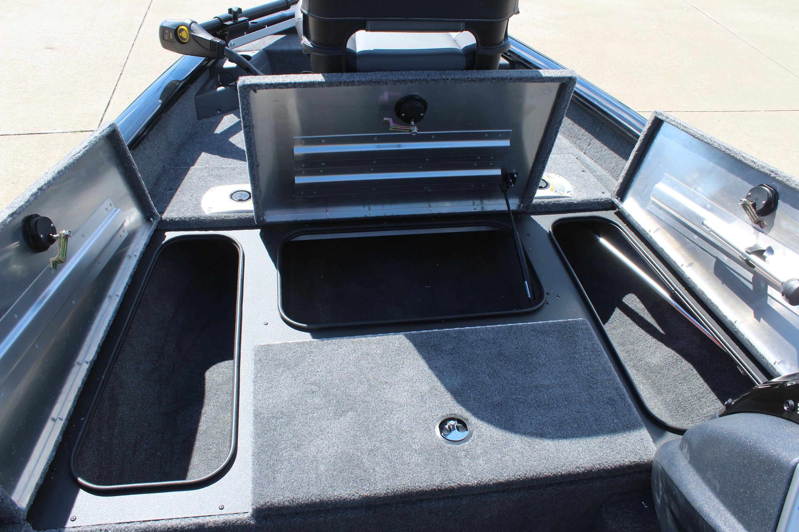 2026 Tracker Pro Team 175 Crappie Edition boat storage compartments open, showcasing ample space.