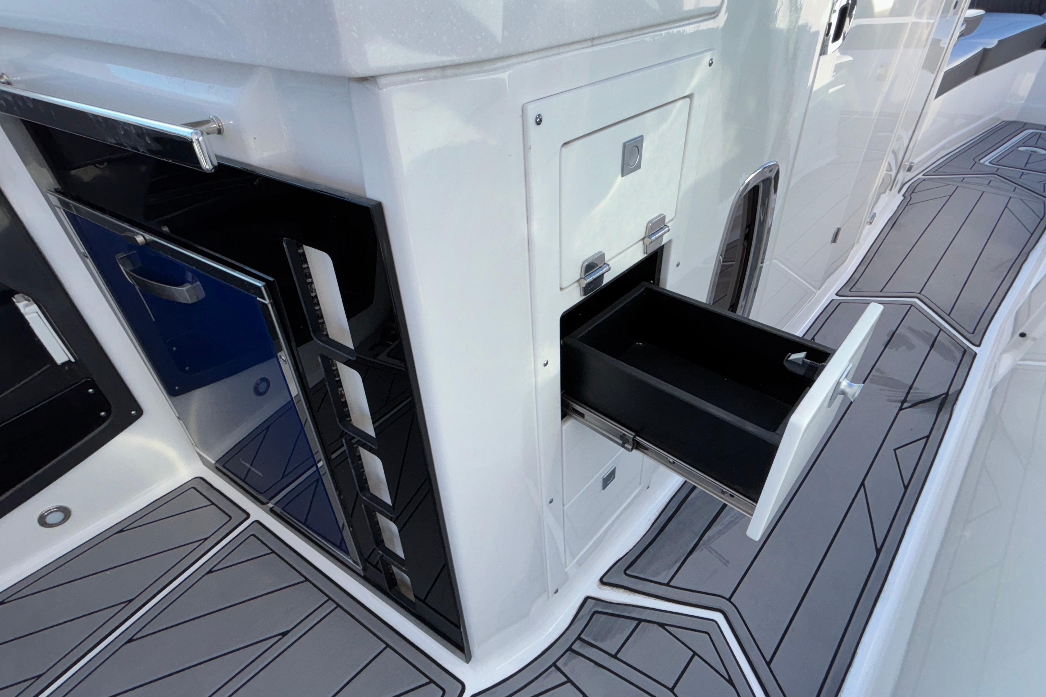 2023 Monterey 385SS Super Sport boat interior with open storage compartments.