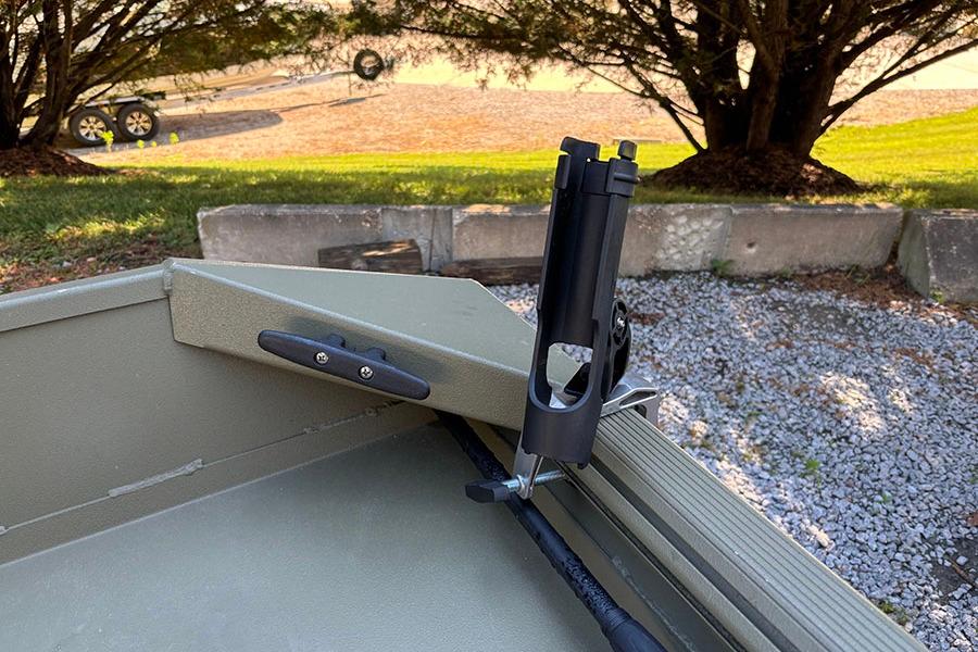 2022 Lowe Roughneck 1660 boat detail with rod holder, outdoors setting.