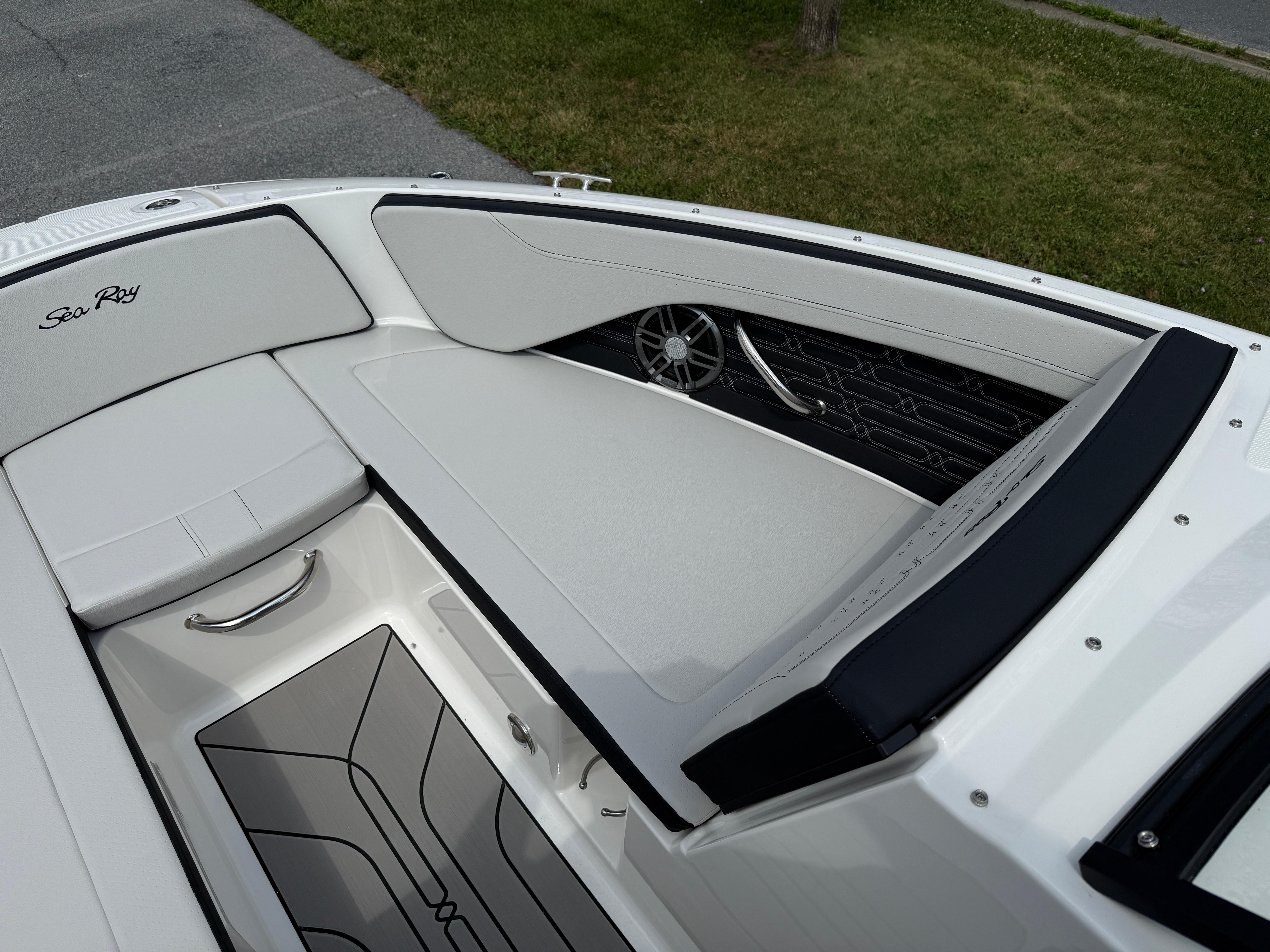 2026 Sea Ray SPX 210 Outboard boat interior with sleek seating and modern design.