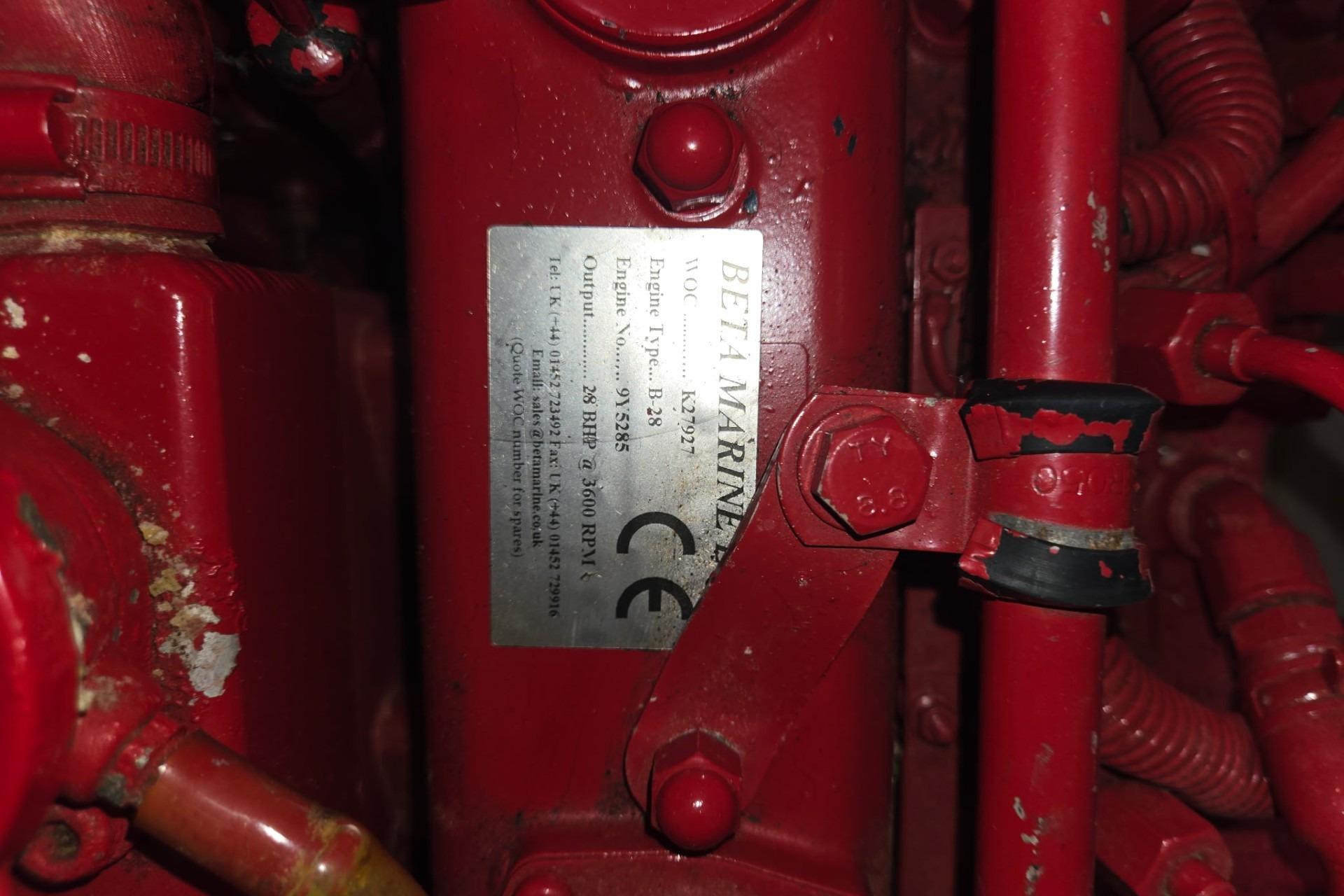 Red Beta Marine engine label on a 1981 Sea Sprite 34 sailboat.