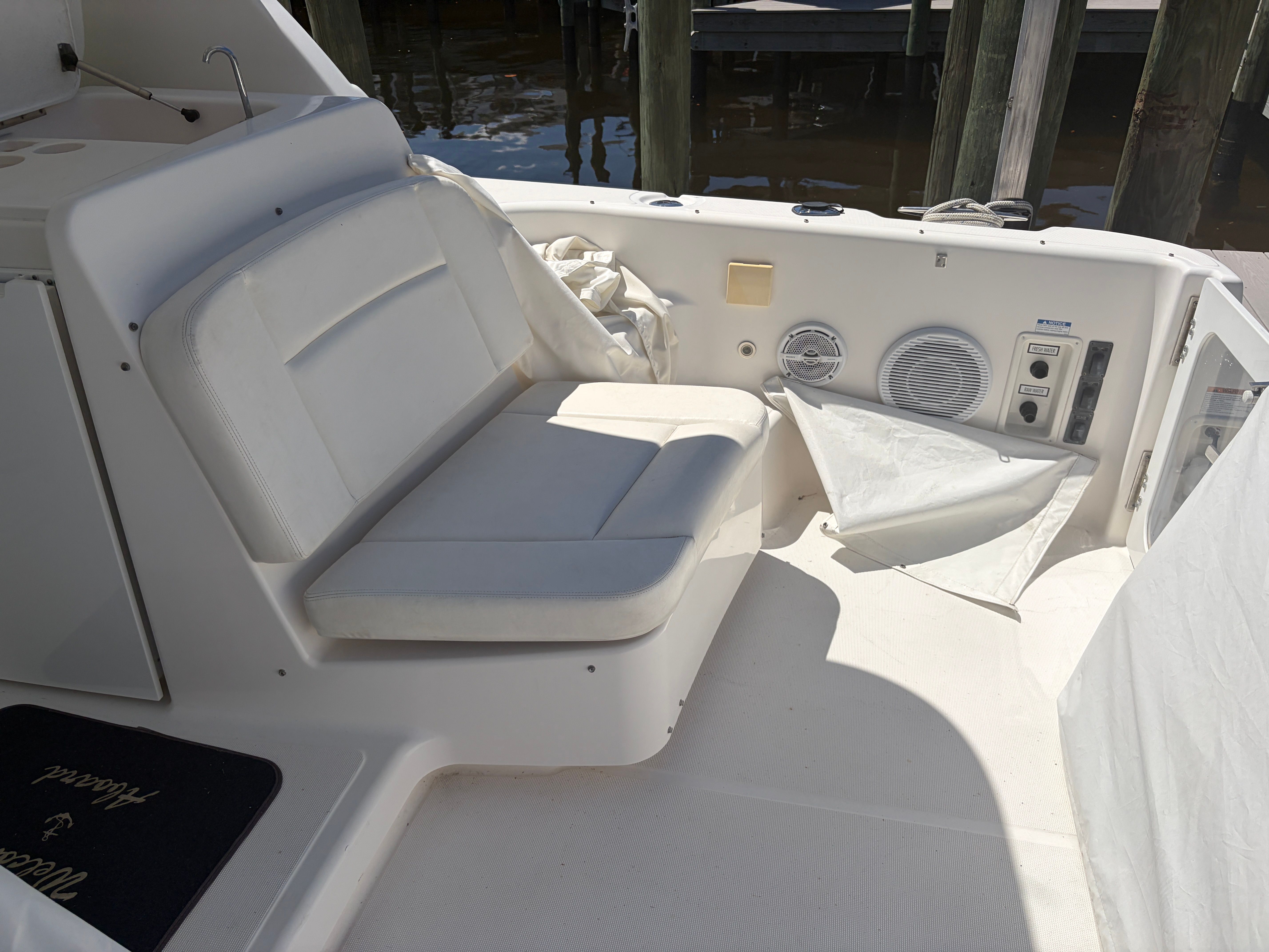 2005 Tiara Yachts Sovran seating area with speakers and controls.