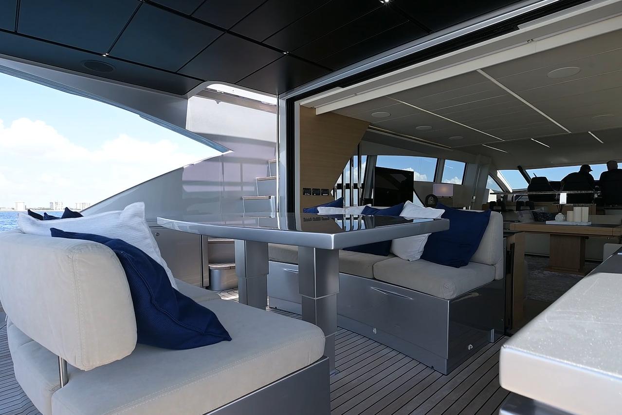 Luxurious 2015 Pershing 92 yacht interior with elegant seating and modern design.