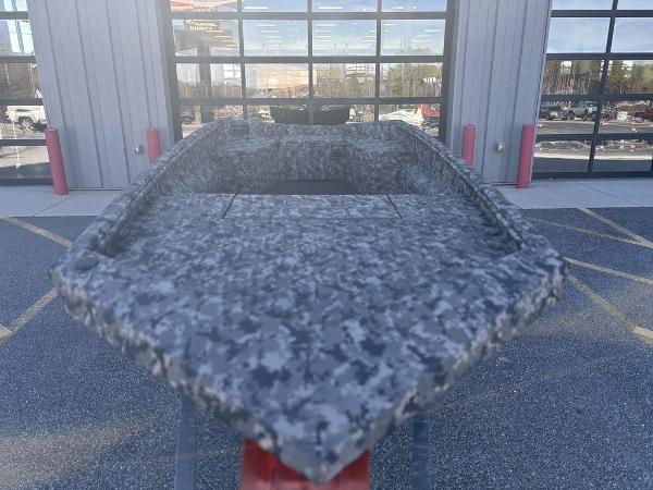 2025 Havoc 1656 VJST boat with camouflage design, displayed outdoors.