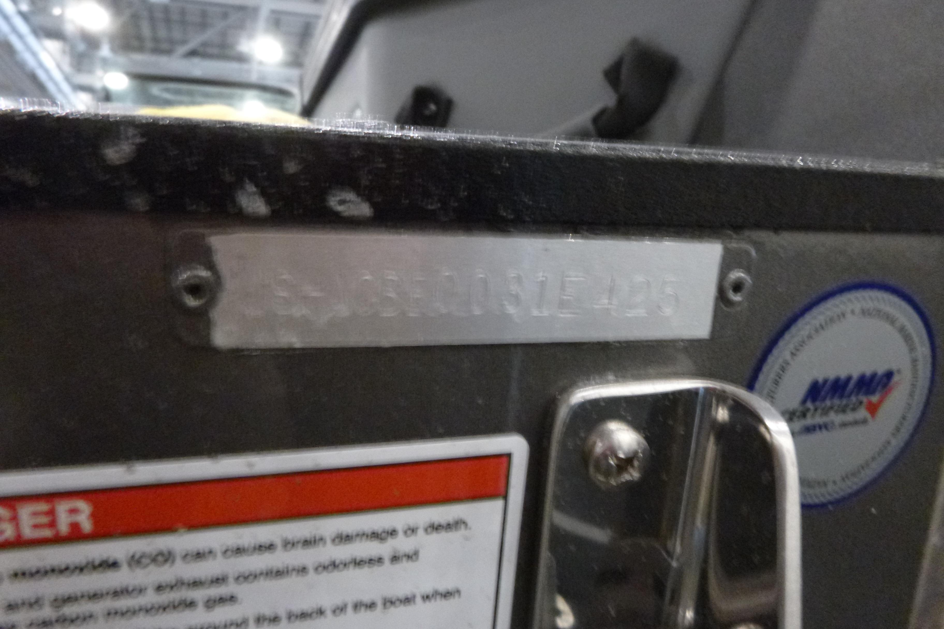 2025 Alumacraft Trophy 185X Sport boat identification plate and warning label.