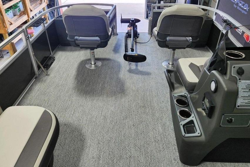 2026 Sun Tracker Bass Buggy 18 DLX interior with seating and control console.